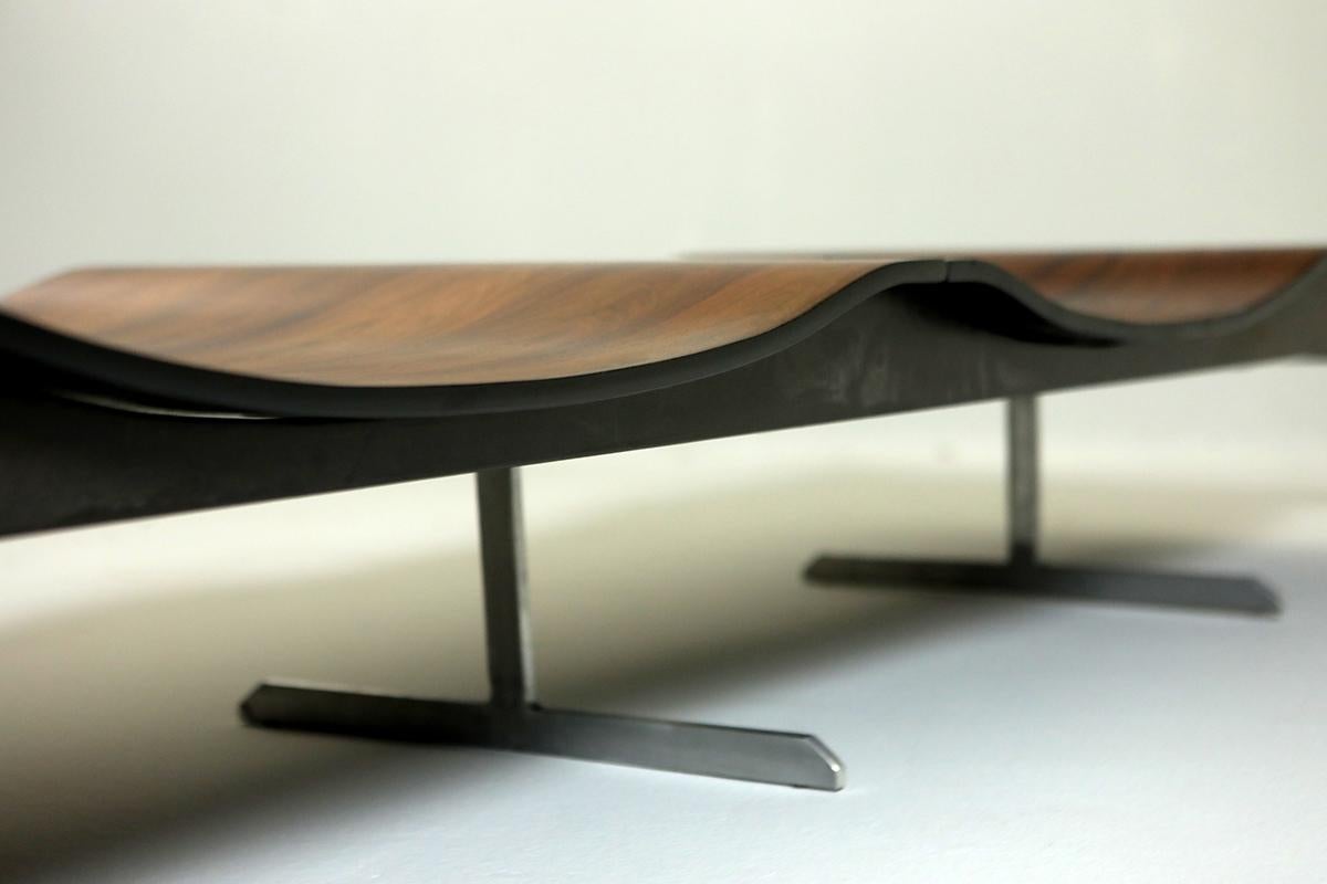 Mid-Century Modern Onda (Wave) bench with magazine holder by Jorge Zalszupin, Brazil, circa 1960s.

Designed by Zalszupin circa 1960s, the Onda bench showcases some of the main characteristics of the designer's work: great technical care in the use