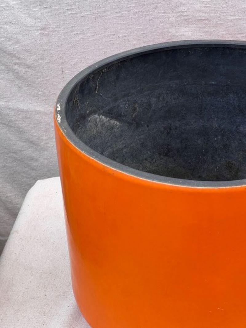 Mid-Century Modern Mid Century Modern Orange and Black Footed Cylinder Ceramic Planter For Sale