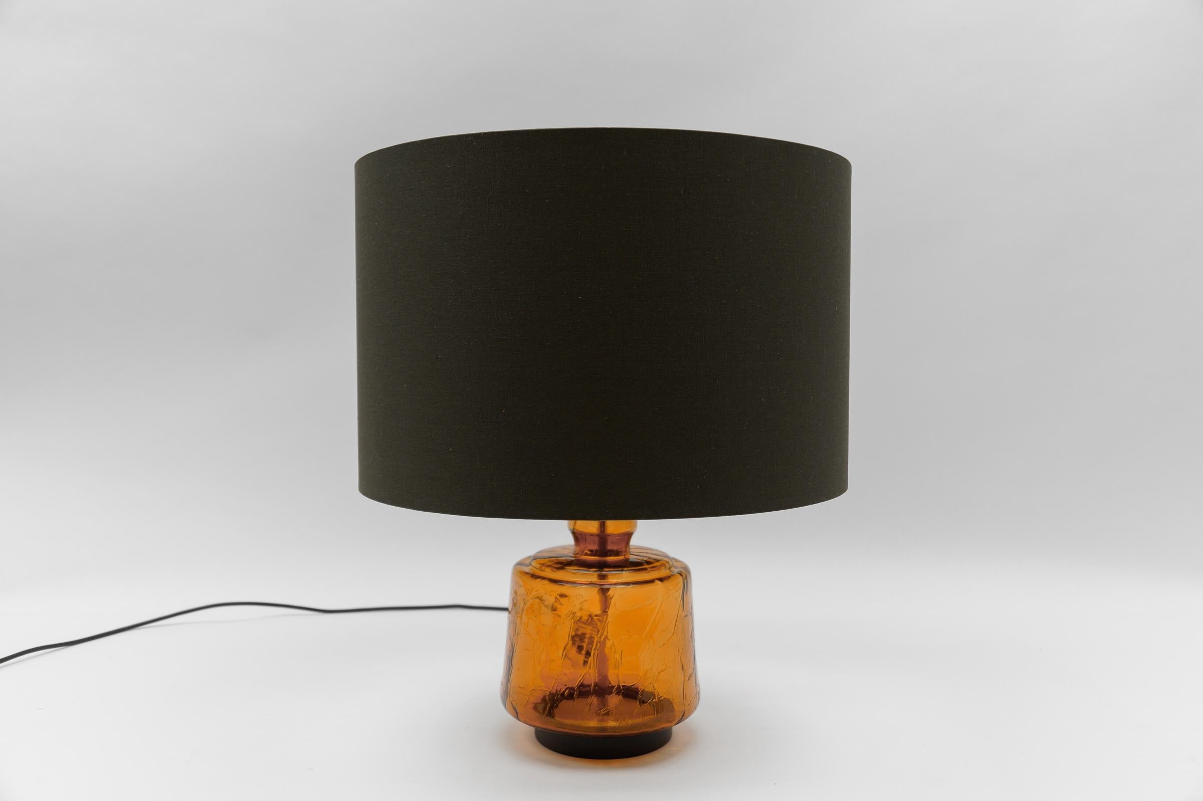 Mid Century Modern Orange Glass Table Lamp Base, 1960s

The lampshade is to illustrate how the lamp base looks with a shade. The shade has a diameter of 17.71 in. (45 cm) and height 11.41 in. (29 cm).

Dimensions
Diameter: 7.48 in. (19 cm)
Height