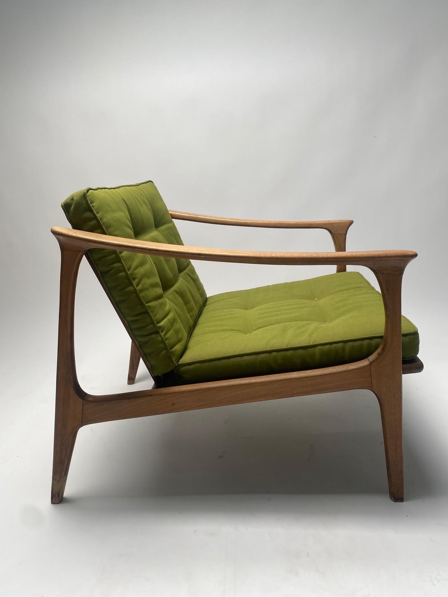 Mid Century modern organic armchair, Denmark, 1960s.

Interesting armchair with wooden structure and fabric cushions in the style of Finn Juhl, Denmark, 1960s