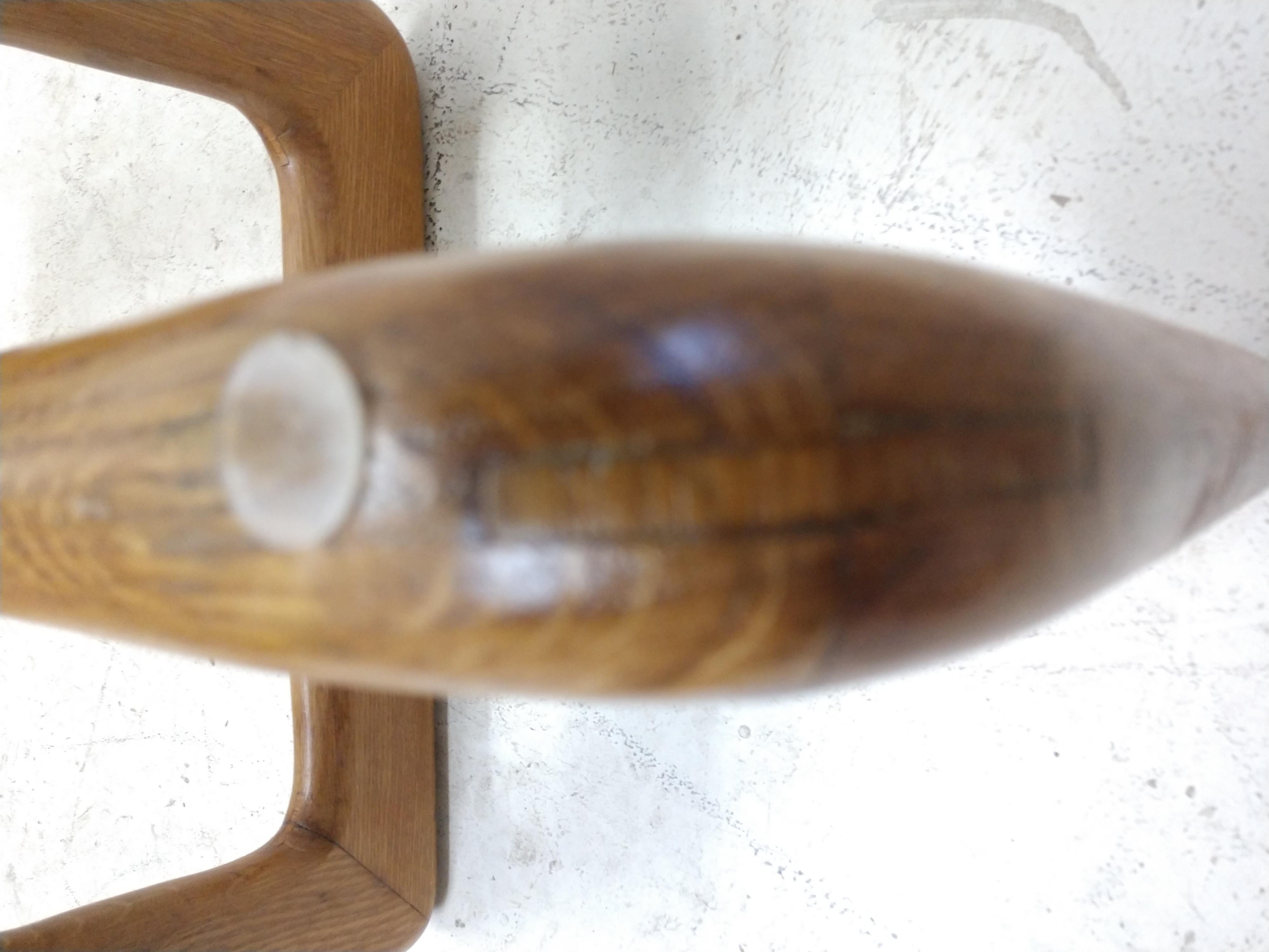 Simple yet elegant glass top table with a interwoven oak base. Two pieces which lock together, splined construction at the corners. Glass top in near perfect condition. This table may very well be a Pearsall design, have not seen this shape before.