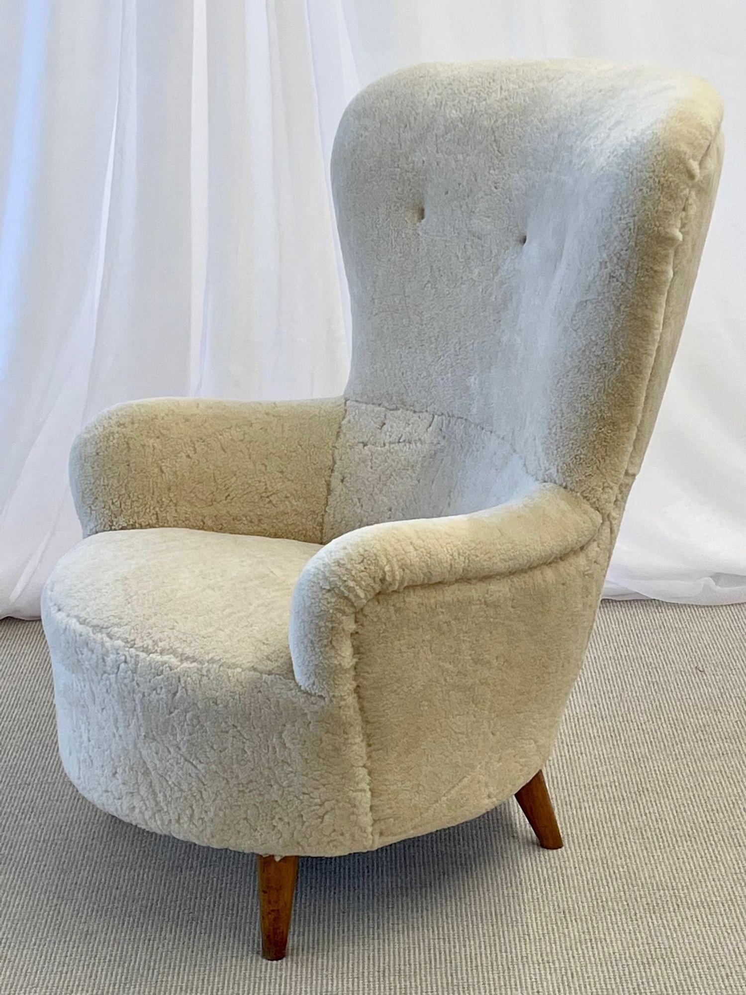 Mid-Century Modern organic form high-back Danish lounge chair, sheepskin, 1950s

Otto Schultz Style
 
Beige sheepskin, lacquered wood
Denmark, 1950s
 
Seat height: 17.5 inches 
 
Other Scandinavian designers of the period include Finn Juhl, Kaare
