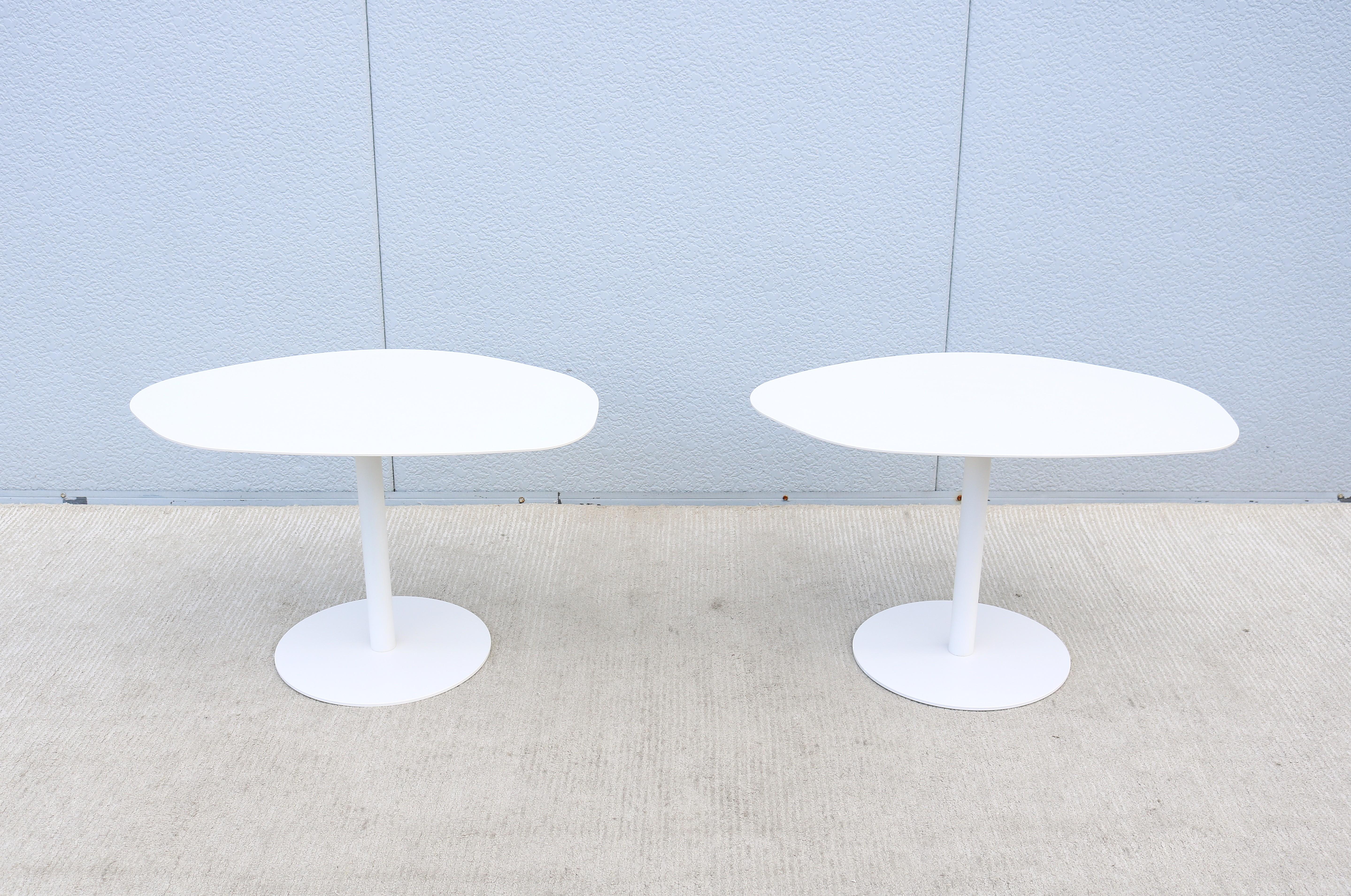 Fabulous pair of mid-century modern style large organic forms steel occasional side tables in snow white color. Attributed to Morten Voss.
An eye-catching design, the unique shape of the thin steel top is inspired by the organic forms found in