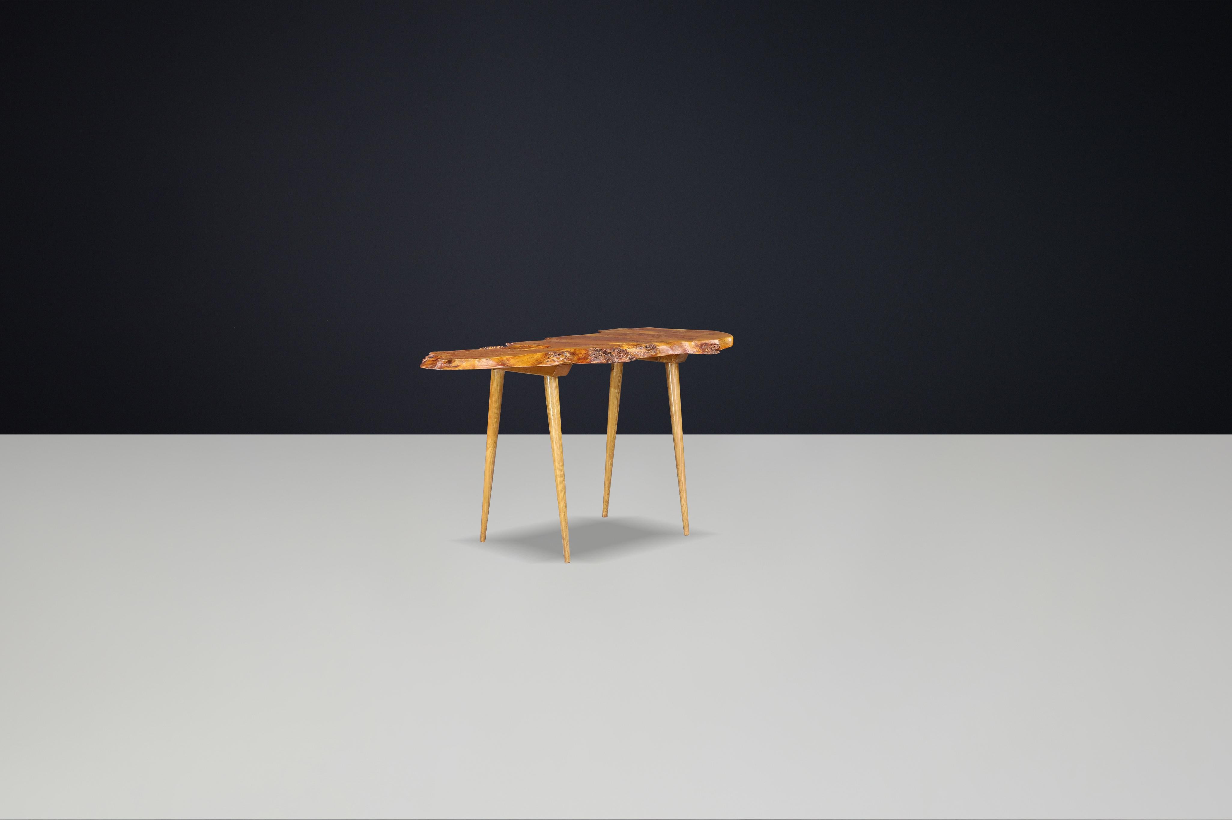 Mid-Century Modern Organic Free-Form Burl Wood Side Table with Four Legs, France, 1960s

This exceptional Mid-Century Modern side table was handcrafted in France during the 1960s and is a striking example of organic modern design. Made from richly