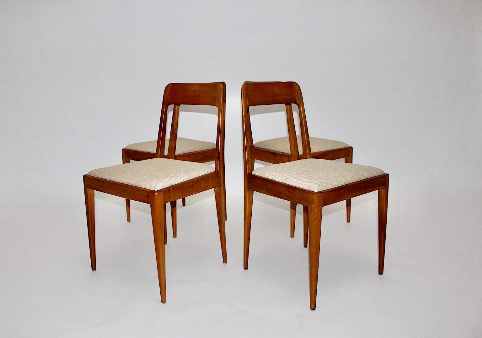 Mid-Century Modern vintage authentic four ( 4 ) dining chairs model A7 from solid walnut by Werkstätte Carl Auböck und Robert Nessler, 1950s Vienna.
A wonderful set of four dining chairs or chairs by Werkstätte Carl Auböck und Robert Nessler from