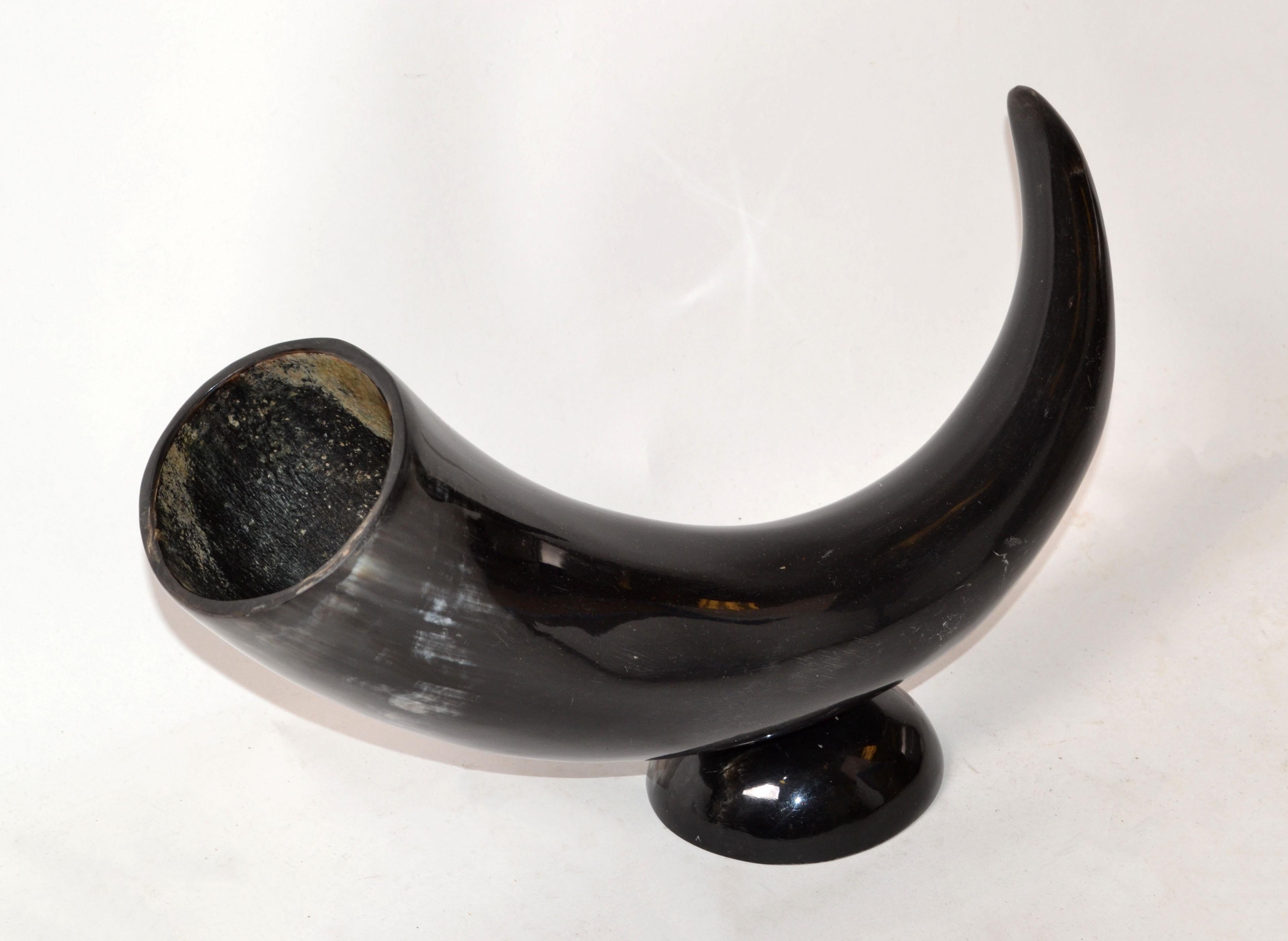 Mid-Century Modern original cow Horn table sculpture or centerpiece mounted on a round base.
      
    