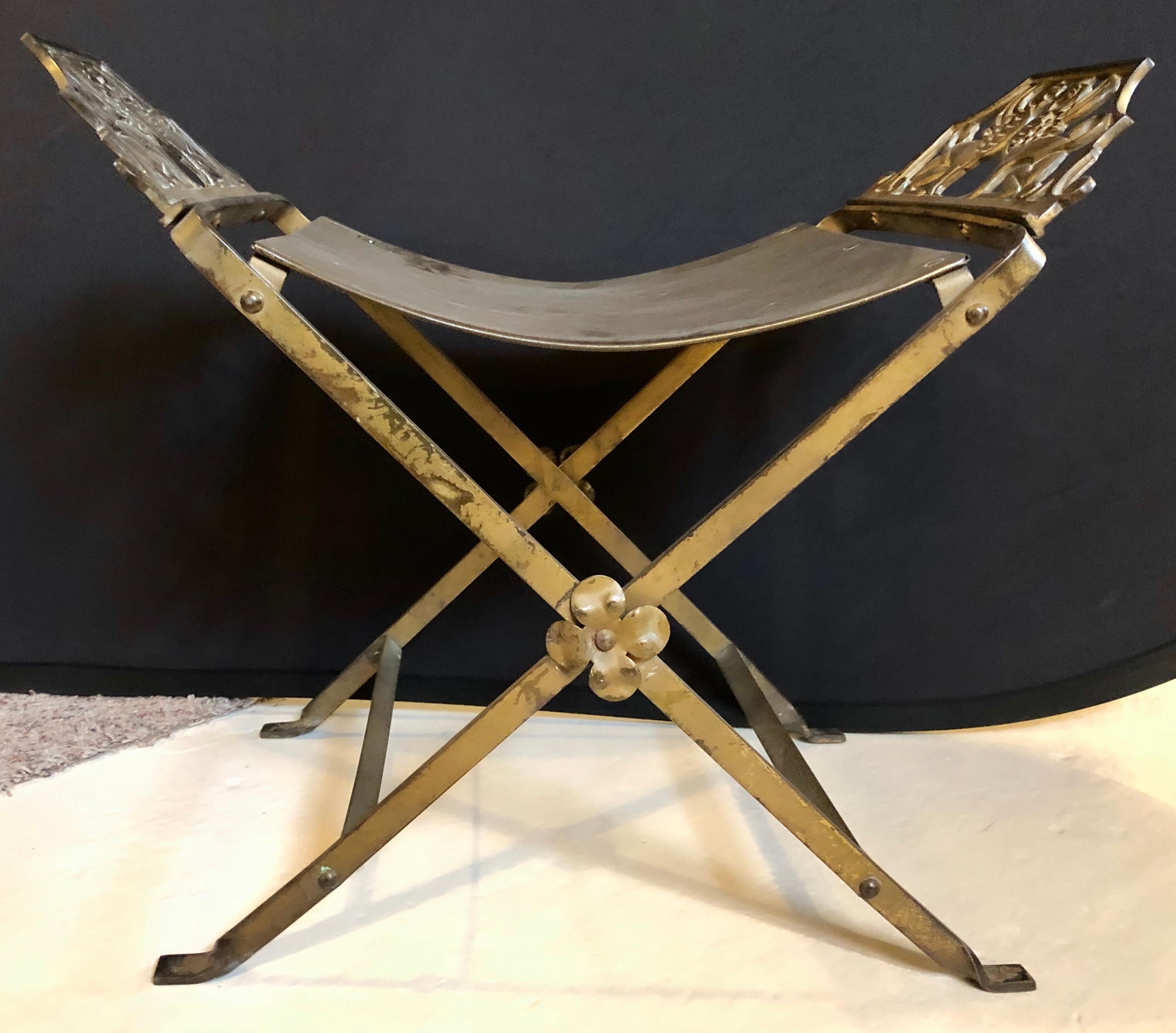Mid-Century Modern Oscar Bach style iron X-base bench stool with winged griffin sides



SX.