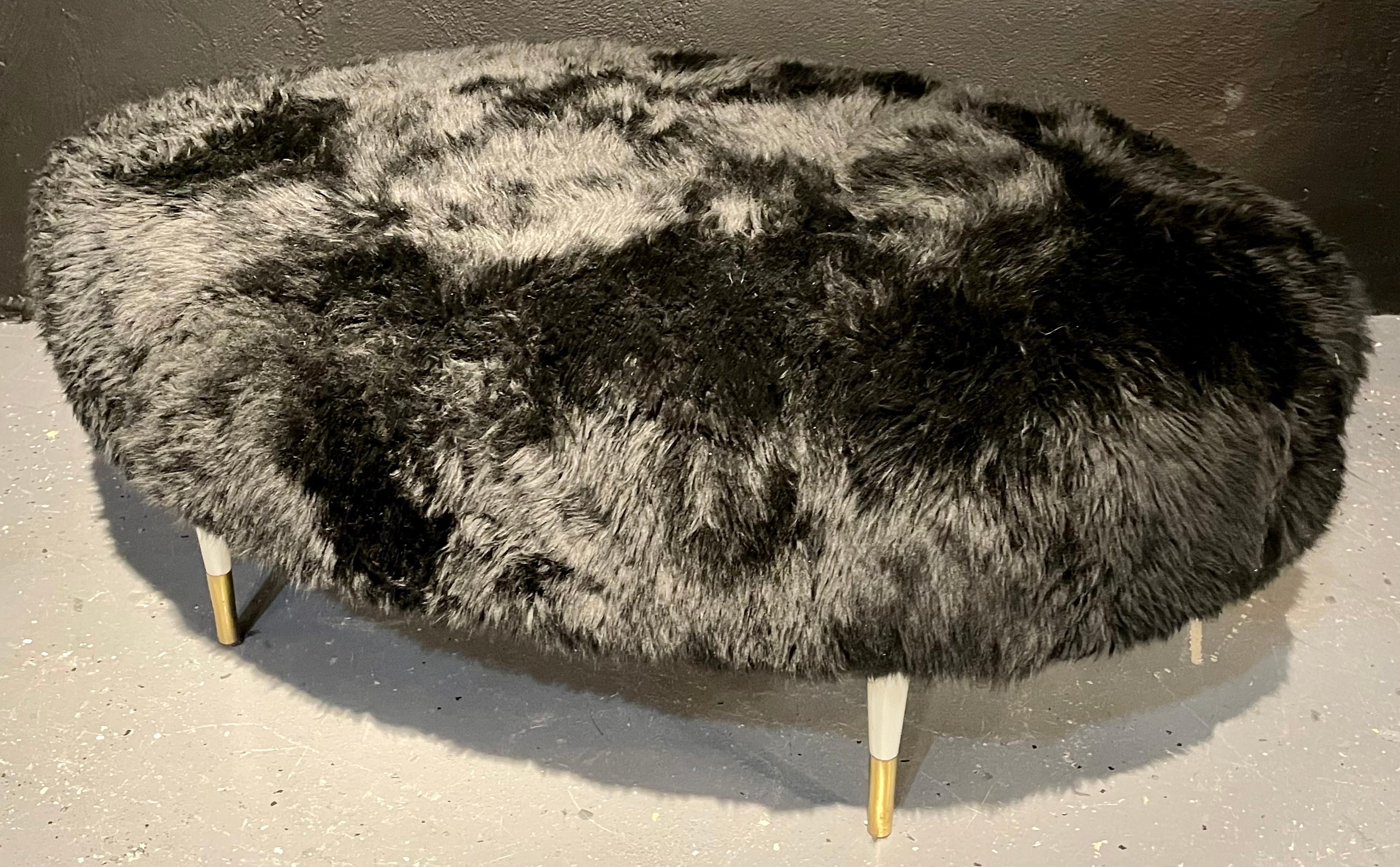 Mid-Century Modern Ottoman / Foot-Stool by Bradley Hughes, Sheepskin Upholstery
 
Italian Mid-Century Modern ottoman having Bradley Hughes sheepskin upholstery. This stunning large and impressive ottoman is large enough to lay down on. The sleek