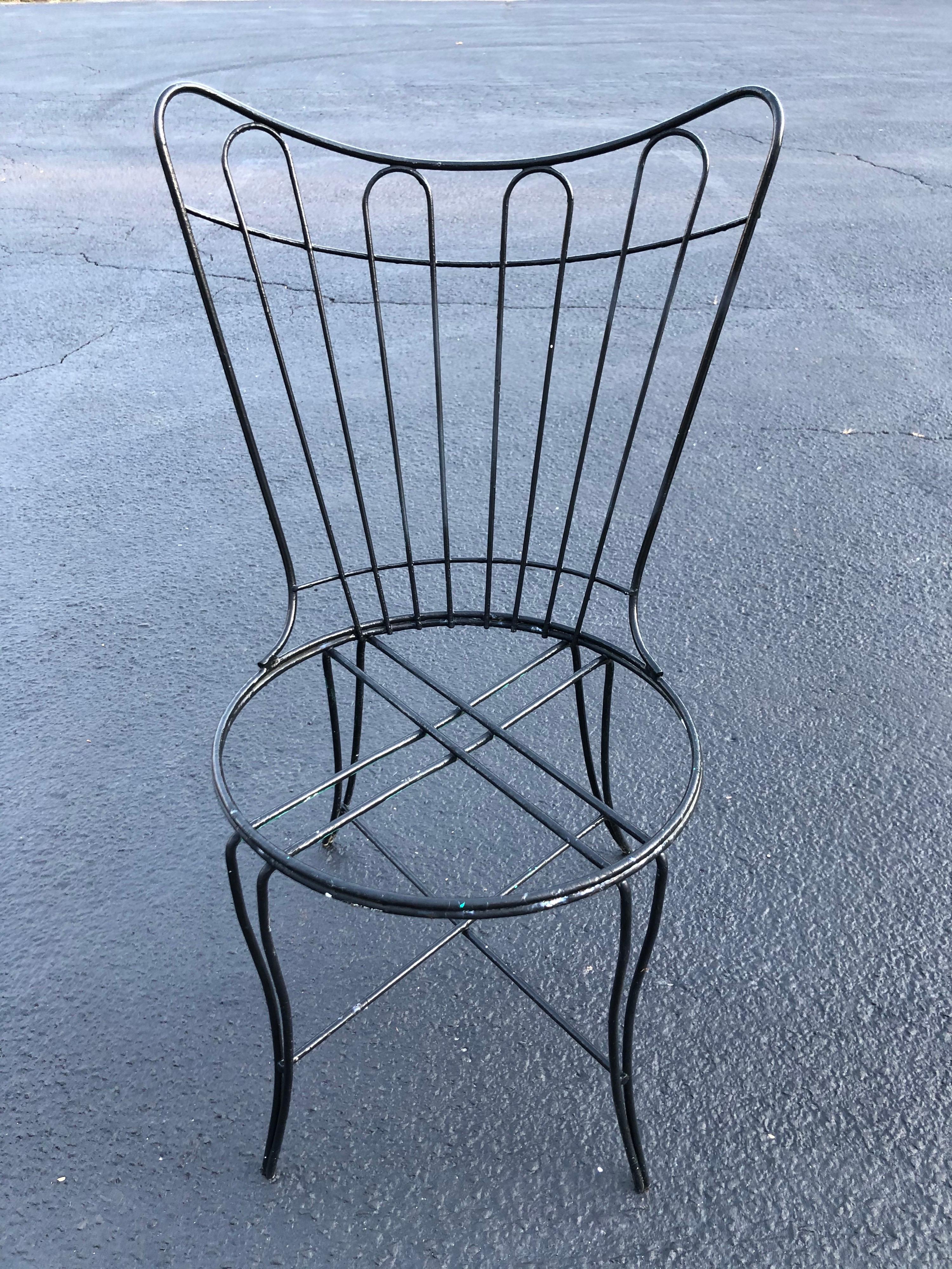 Mid-Century Modern outdoor patio chair by Homecrest. Black iron attributed to John Salterini for Woodard. Needs a cushion. Seat height without cushion 16.50