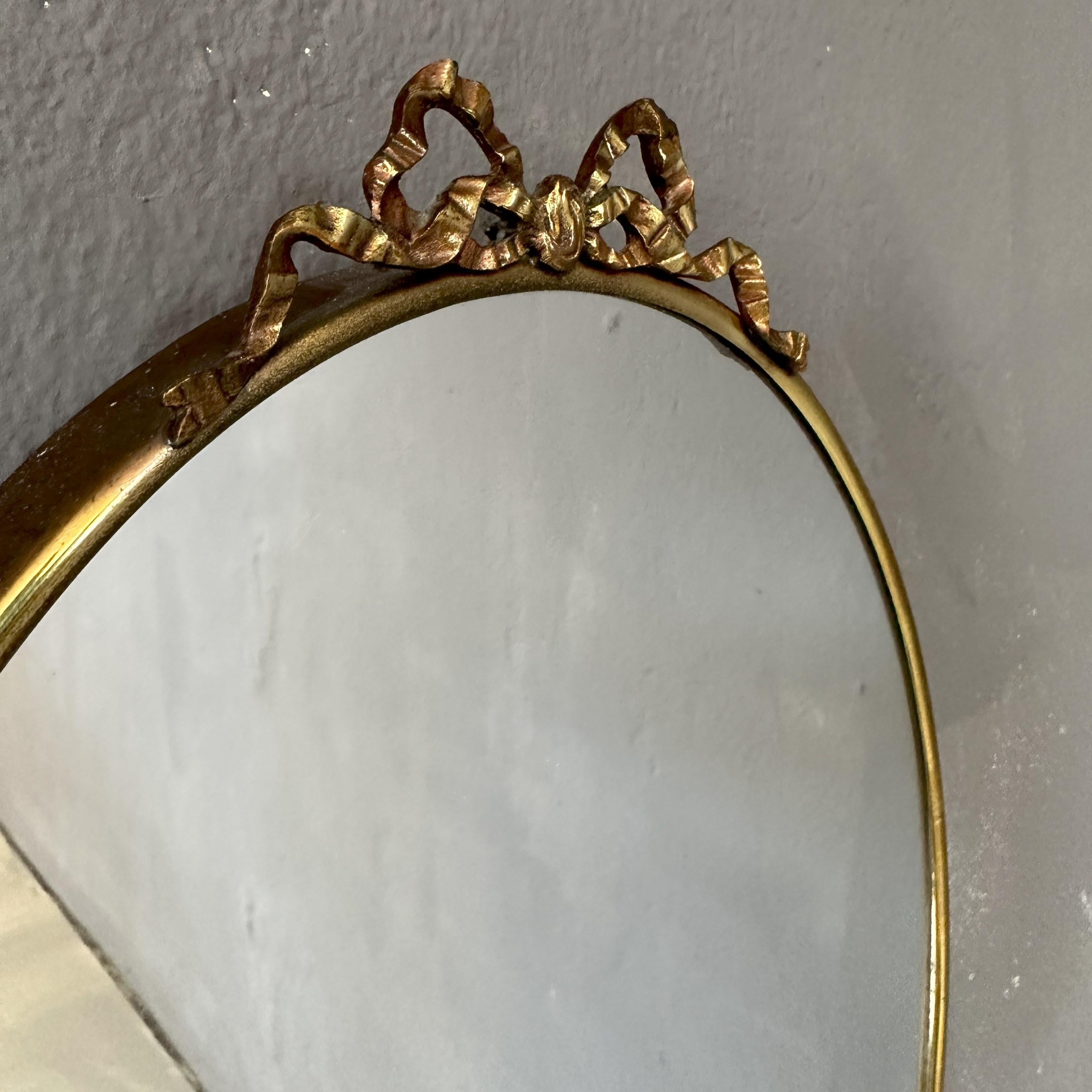 Brass Mid-Century Modern, Oval mirror 1950s, Italian manufacture, with brass frame For Sale