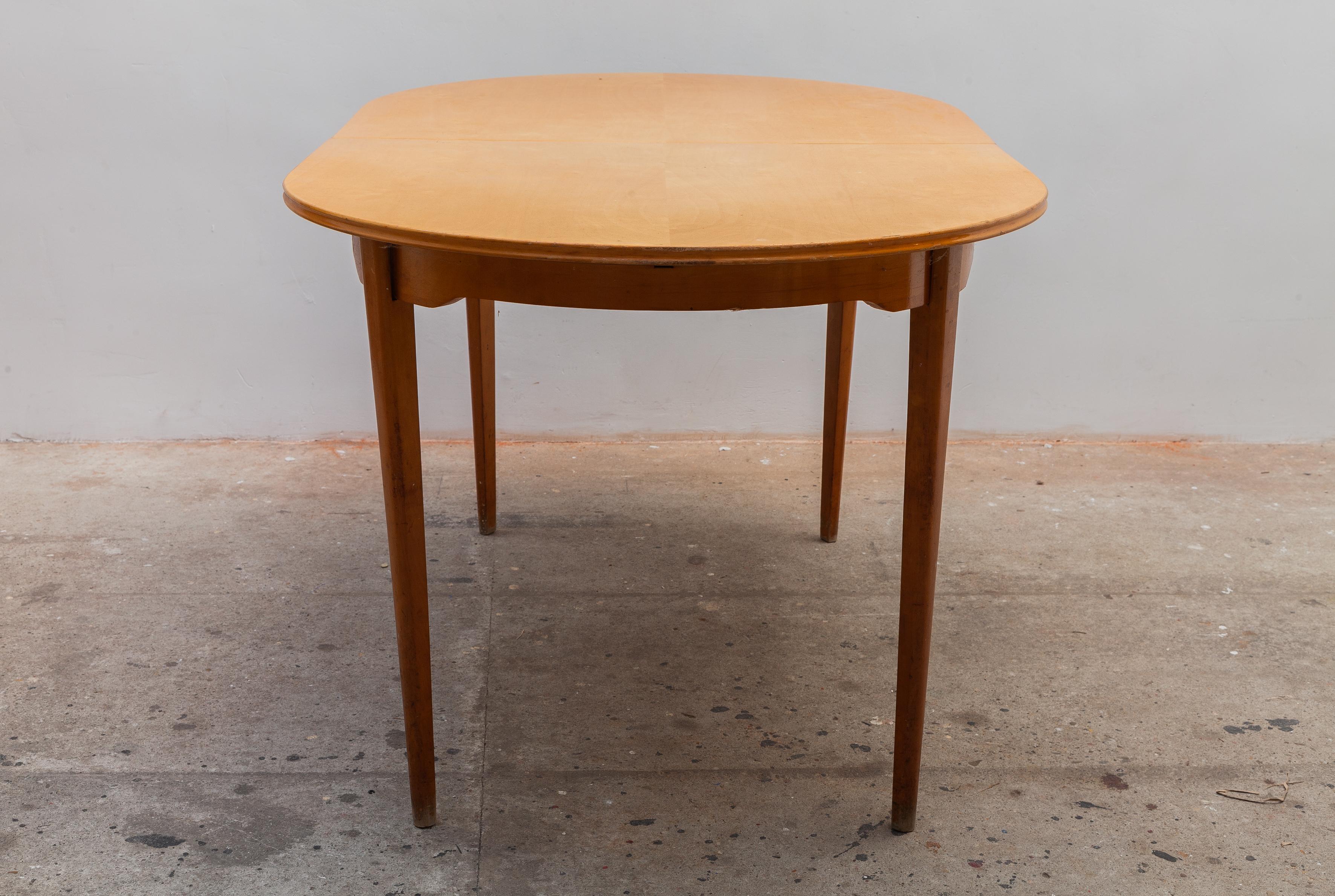 mid century modern oval dining table