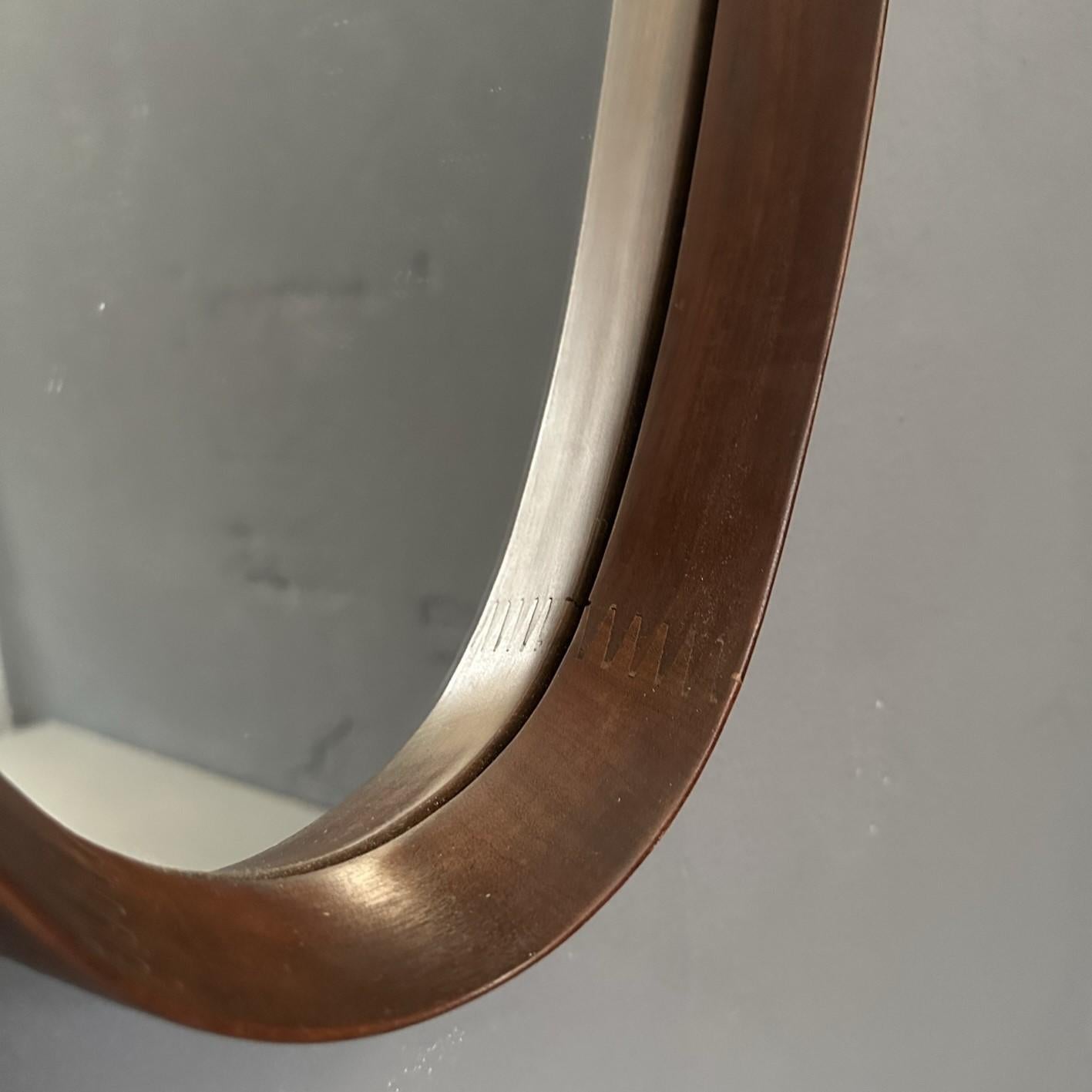 Mid-Century Modern Oval vintage mirror, 1960s teak frame, Italian manufacturing For Sale 1