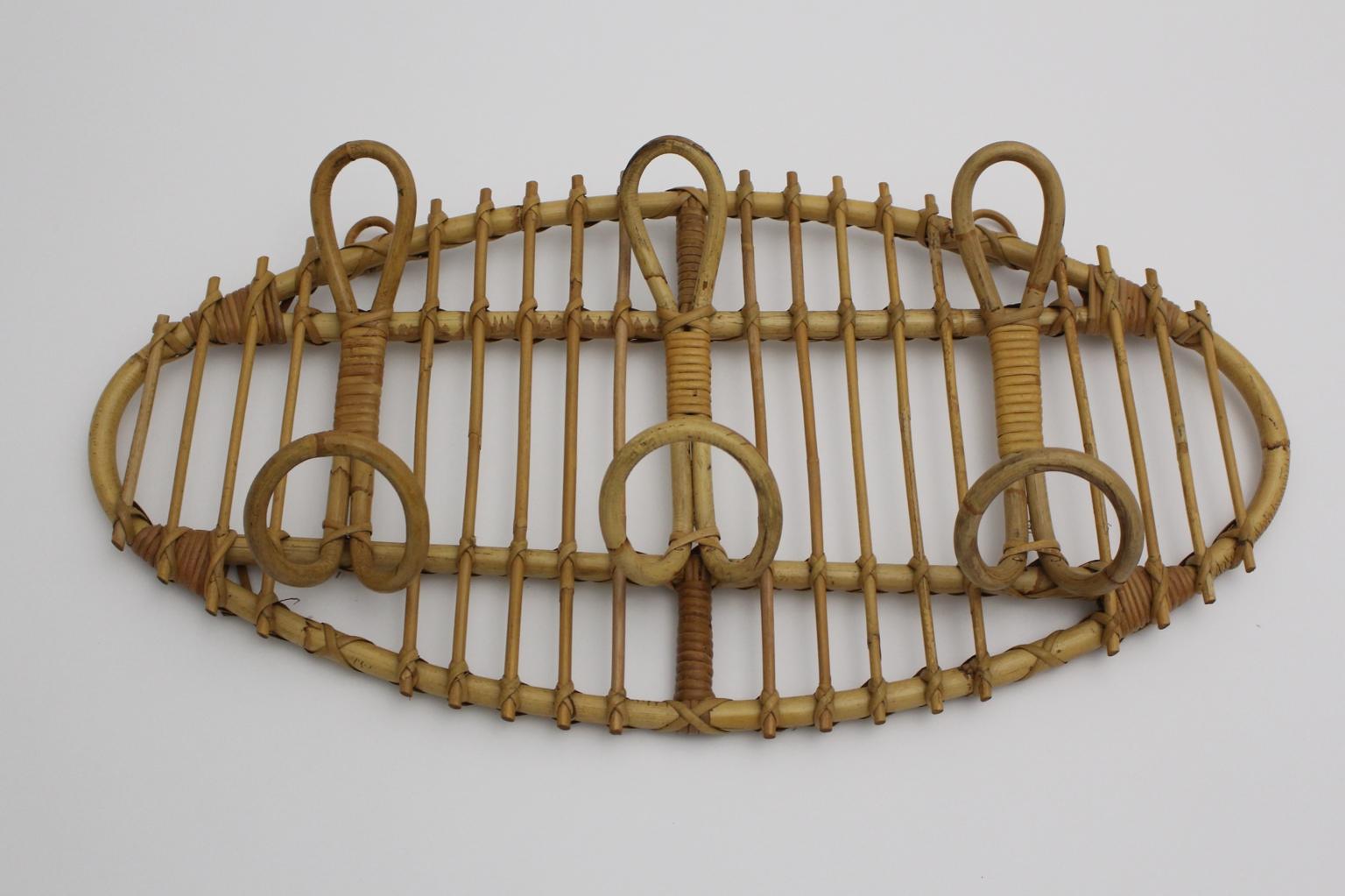 Italian Mid-Century Modern Oval Vintage Rattan Coat Wall Hooks, Italy, circa 1960 For Sale