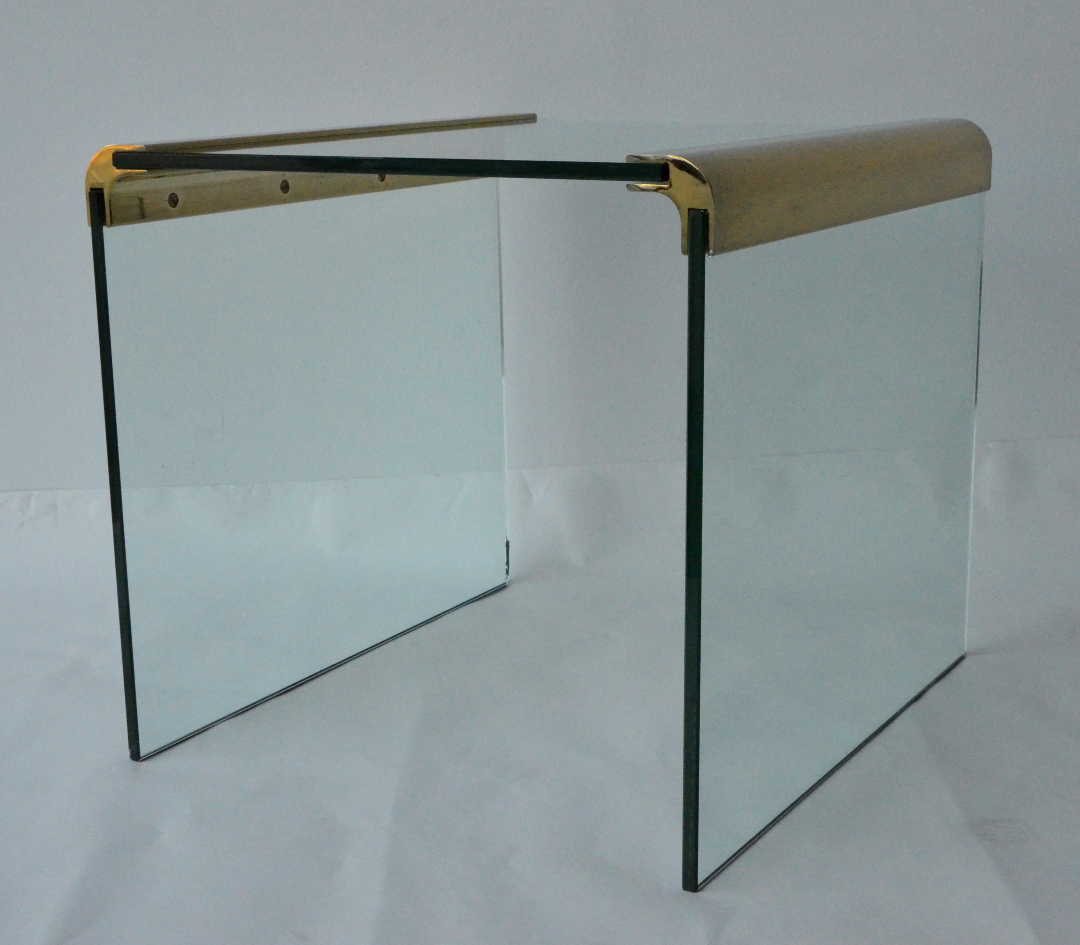 Offered is a Mid-Century Modern pace waterfall brass bar and three sided glass end or side table. Leon Rosen in York City founded pace and was in business from the 1970s-2001. The inimitable Rosen style used exotic wood veneers that had high-gloss