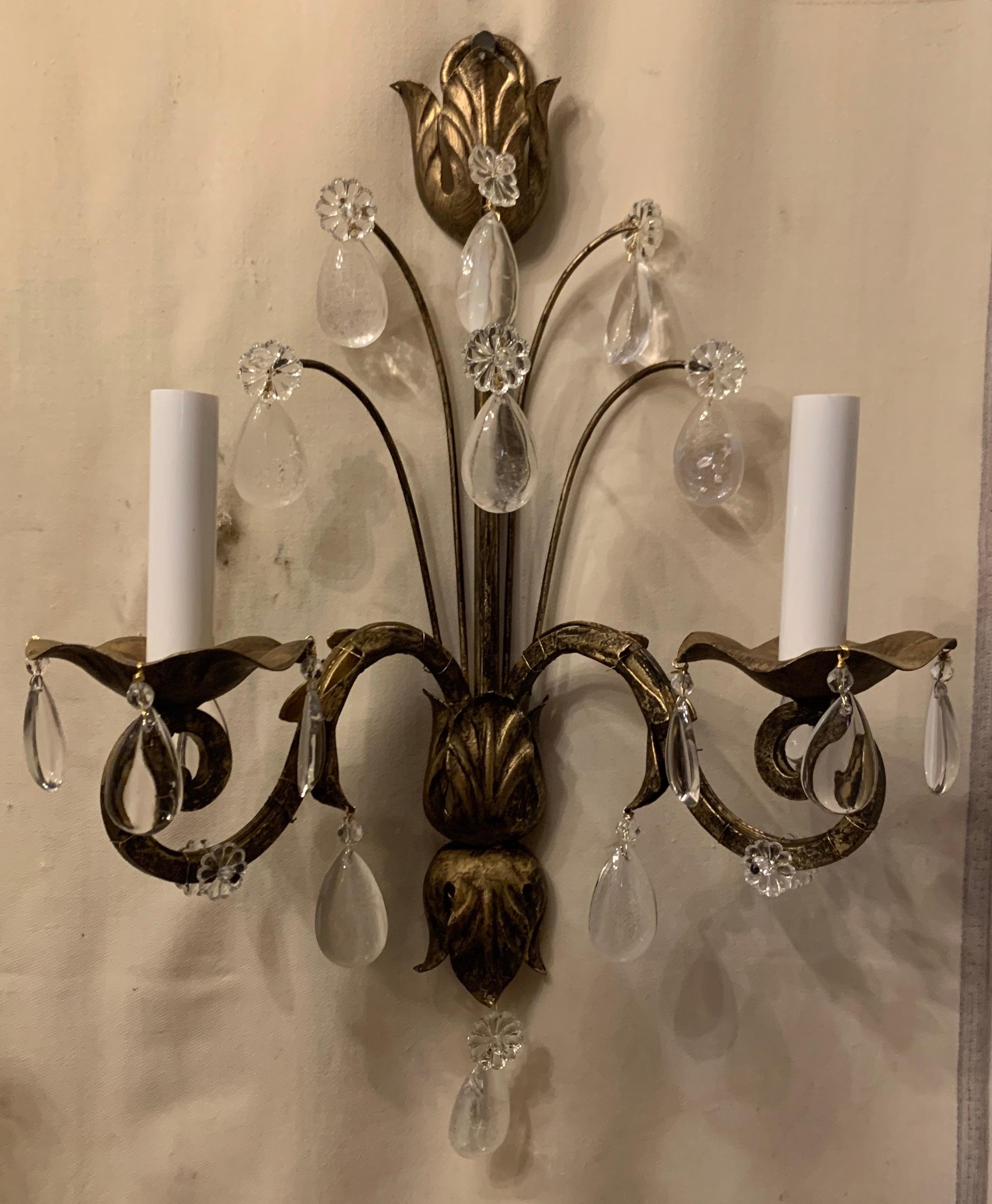 A wonderful pair Mid-Century Modern Baguès style French rock crystal leaf flower beaded crystal sconces completely rewired.