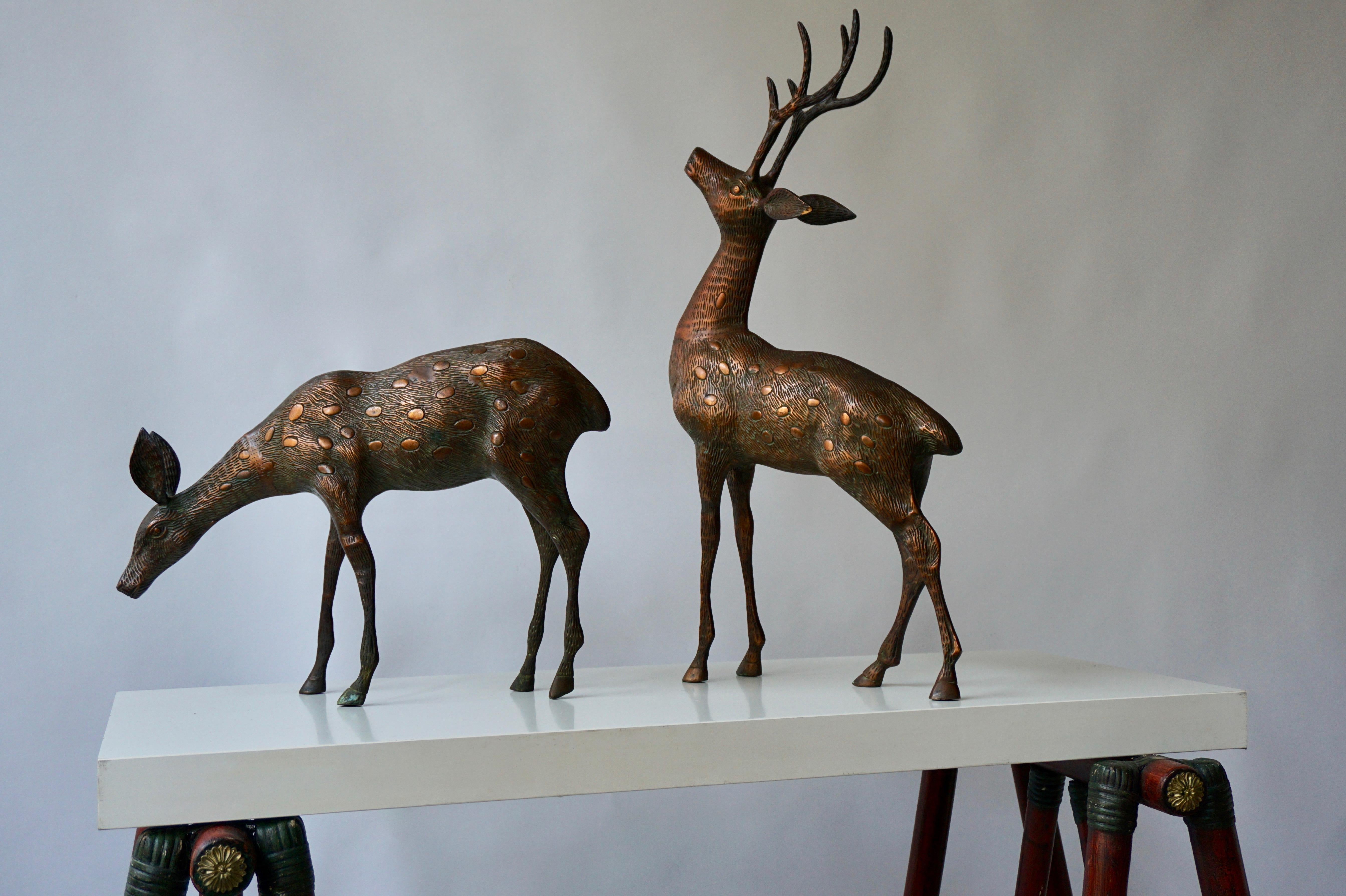 large brass deer statues