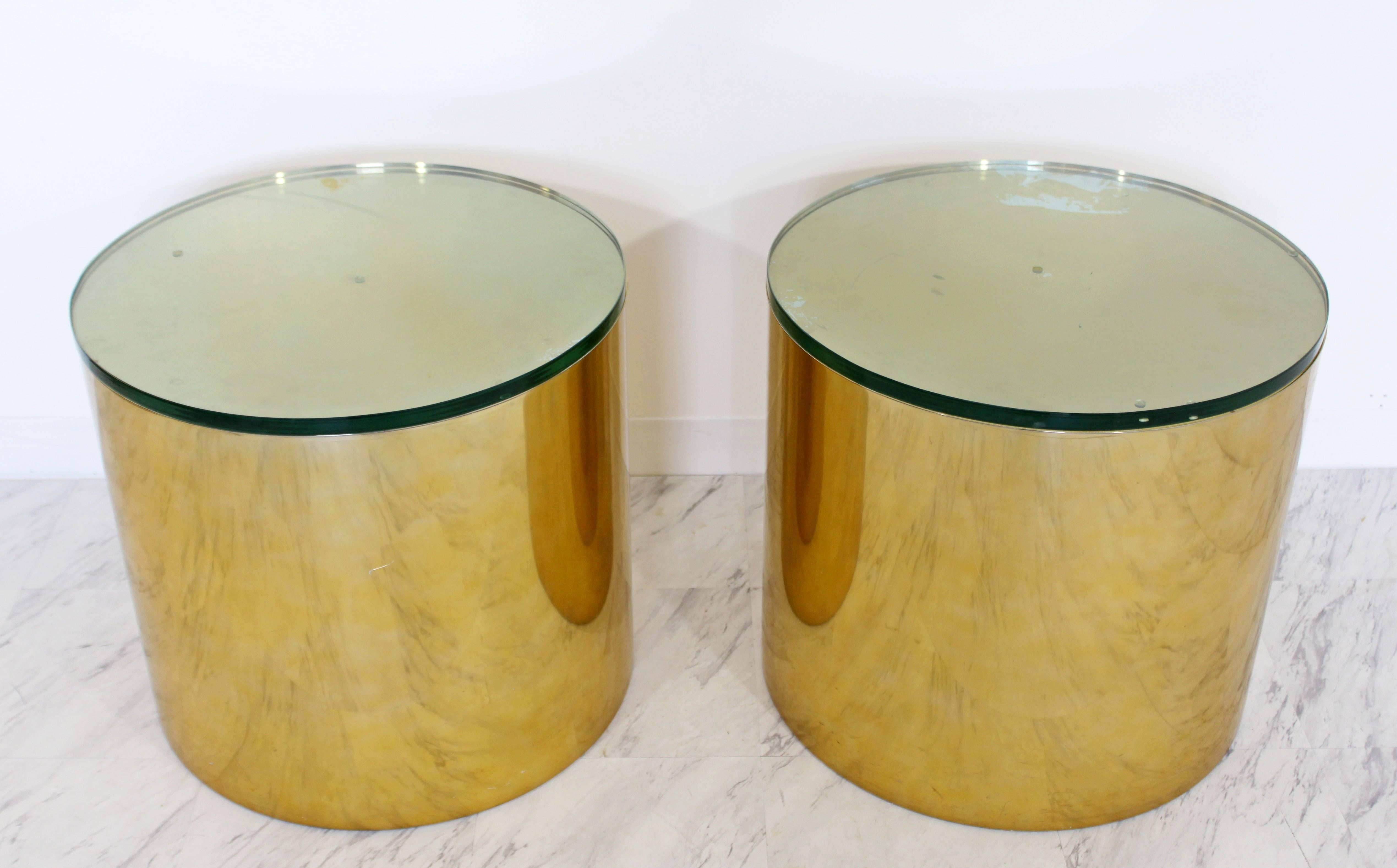 For your consideration is an utterly fabulous, pair of brass polished aluminium, round drum side or end tables, with green glass tops, that were designed by Paul Mayen for Habitat International, circa 1970s. In great vintage condition, with some