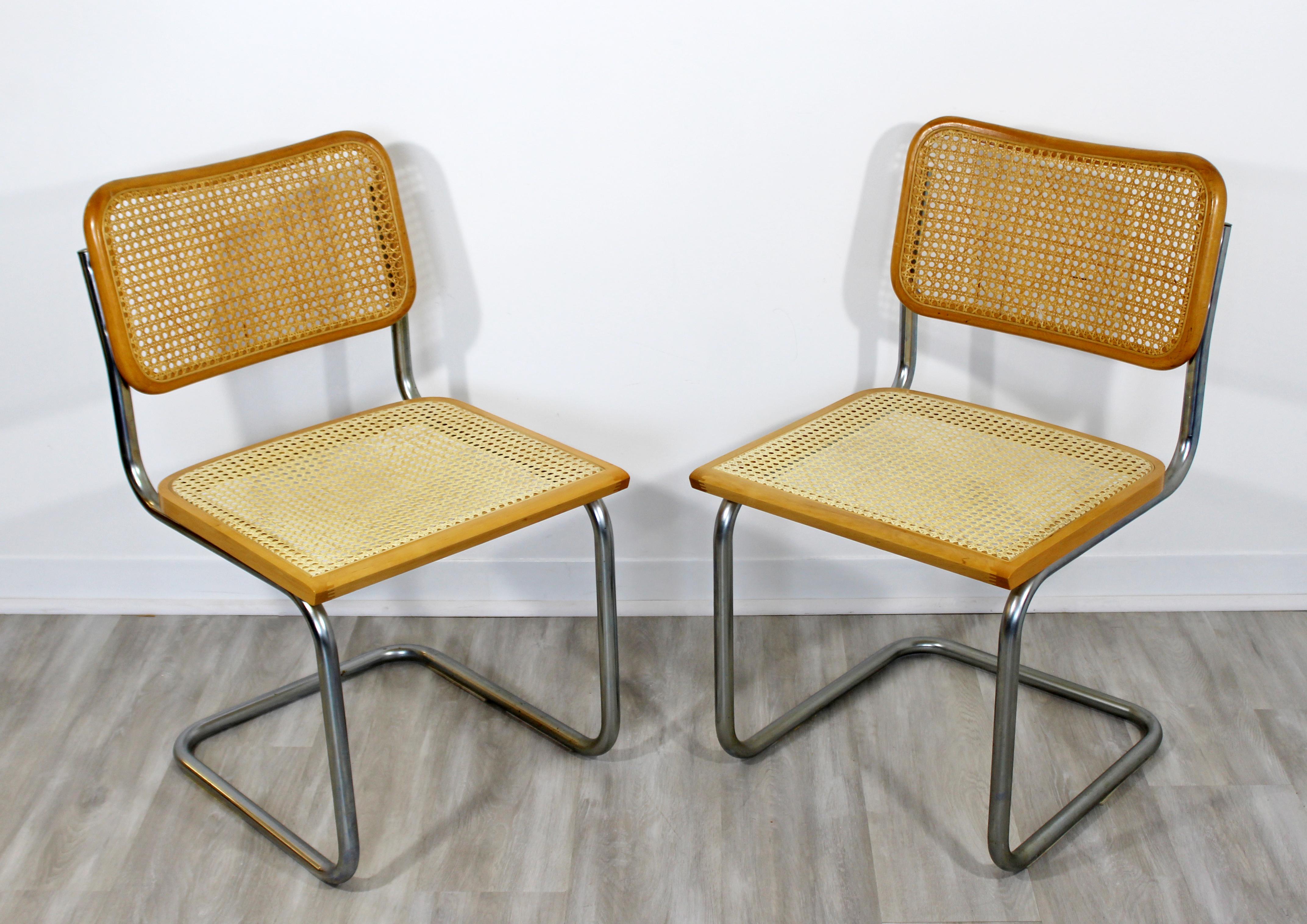 For your consideration is a lovely pair of chrome and rattan, cantilever side chairs, by Marcel Breuer, circa the 1970s. In excellent vintage condition. The dimensions are 18.5