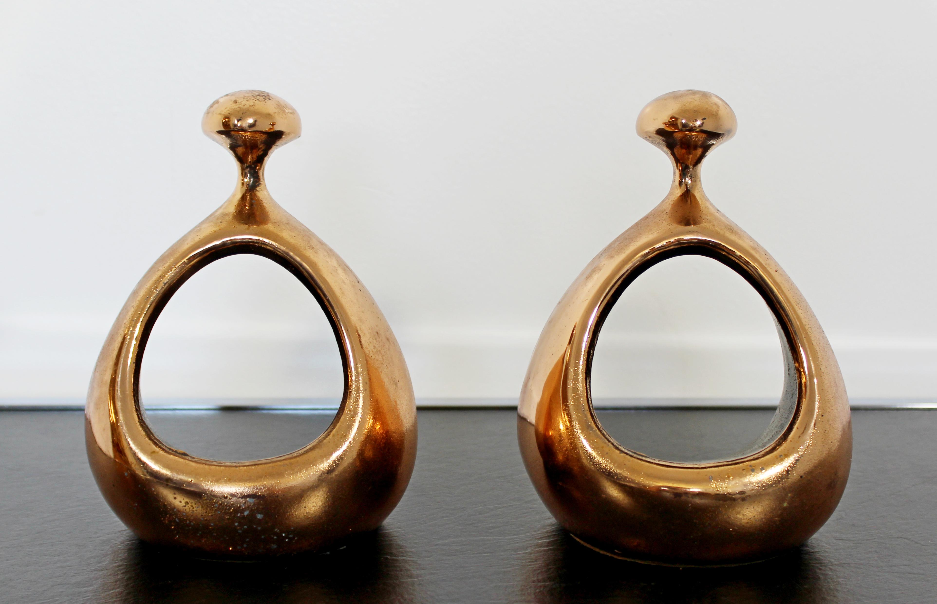 For your consideration is a wonderful pair of copper colored bookends, by Ben Siebel, circa 1950s. In very good vintage condition, with a patina to match the age. The dimensions of each are 5
