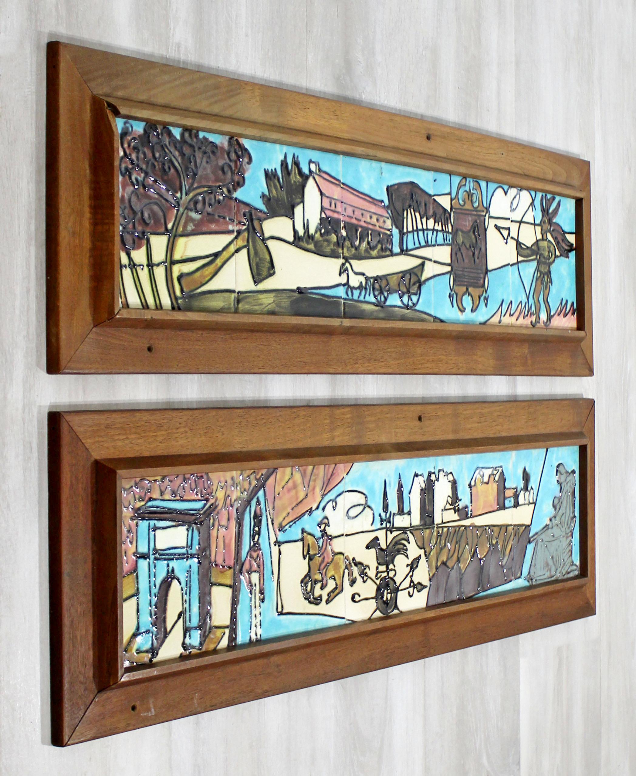 For your consideration is a beautiful pair of framed, Harris Strong, Americana, ceramic hanging wall sculptures, circa 1960s. In excellent condition. The dimensions of the frames are 34