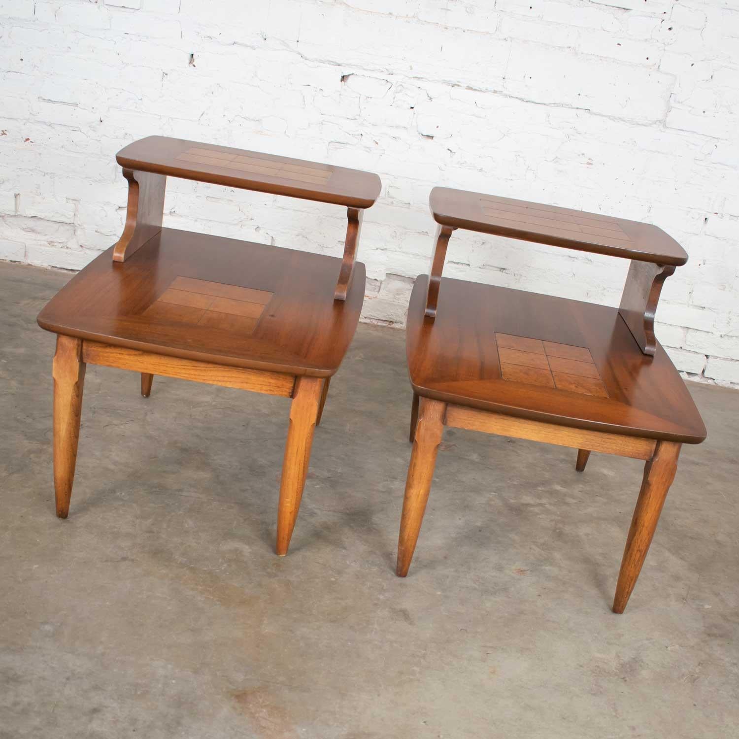 Amazing Mid-Century Modern pair of Lane Alta Vista step table end tables style #1927 walnut with inlaid walnut burl squares in their centers. They are in wonderful condition. The tops have been refinished with a new coat of polyurethane applied. The