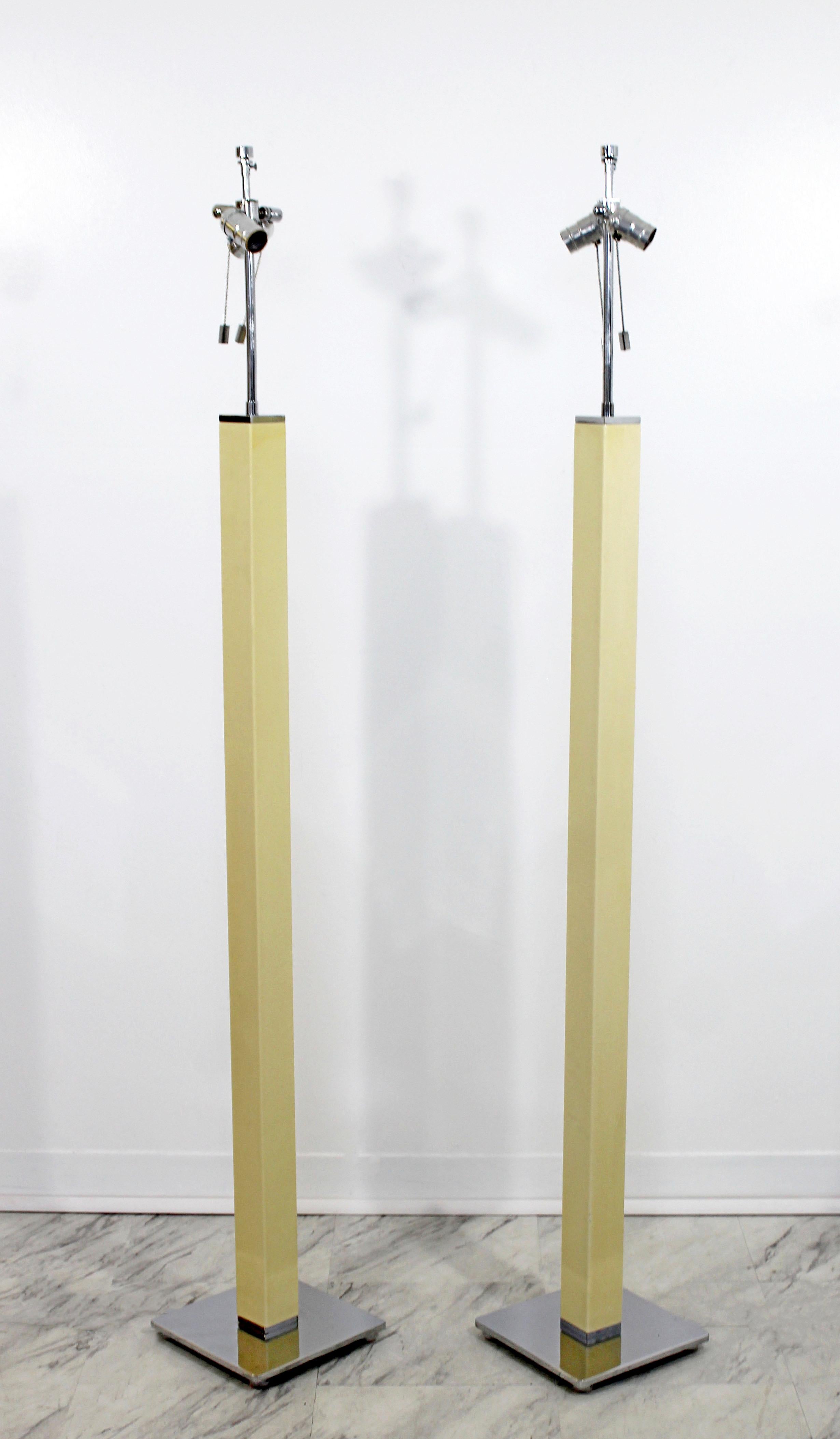 For your consideration is a magnificent pair of column floor lamps, made of chrome and wrapped in yellow lizard, by Karl Springer, circa 1970s. In excellent condition. The dimensions are 9