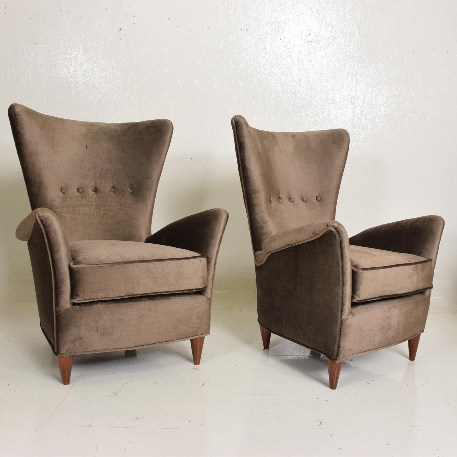 For your consideration, a pair of armchairs of Mid-Century Modern chairs by Gio Ponti for Bristol Hotel in Merano, Italy.

Made in Italy, circa the 1940s. Chairs have been restored with dark grey velvet.

Dimensions: 36 1/2