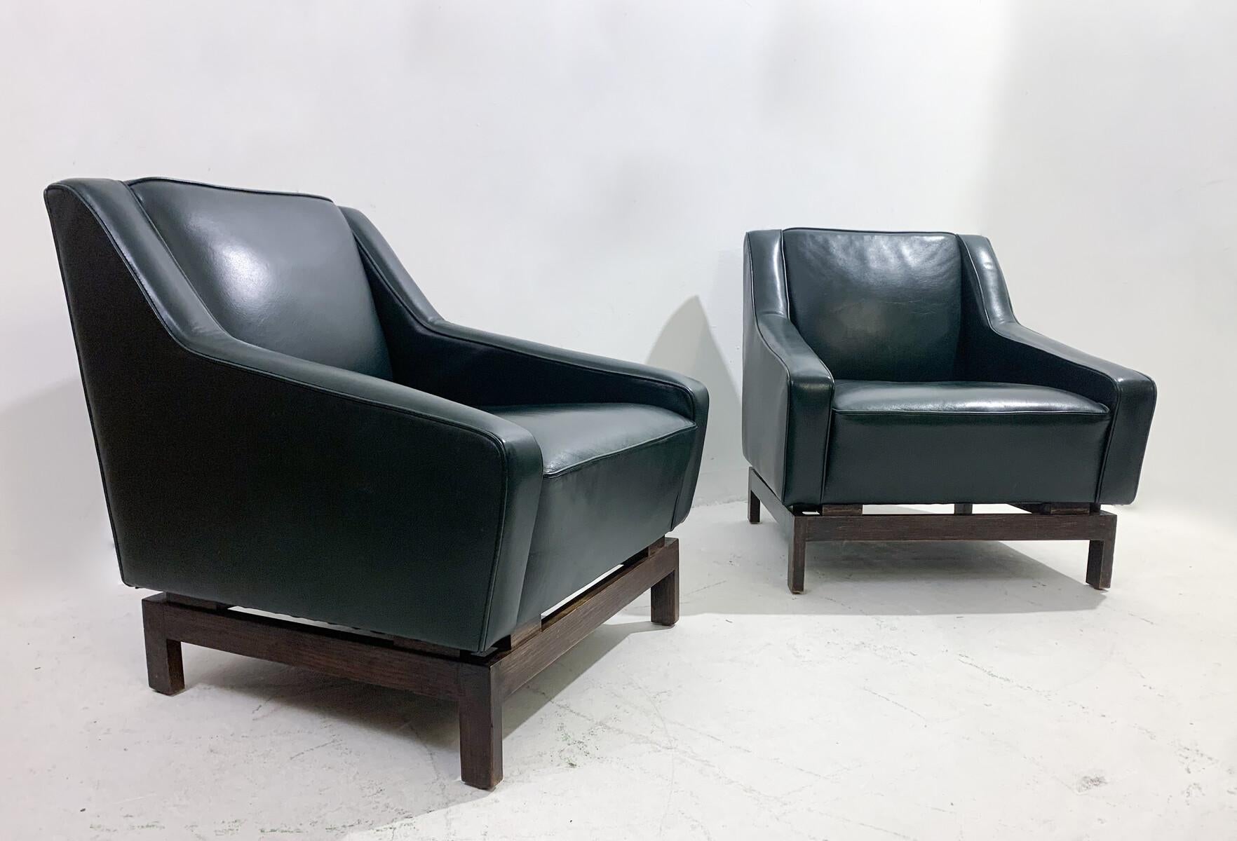 Mid-Century Modern pair of armchairs by Emiel Veranneman, leather, 1958.