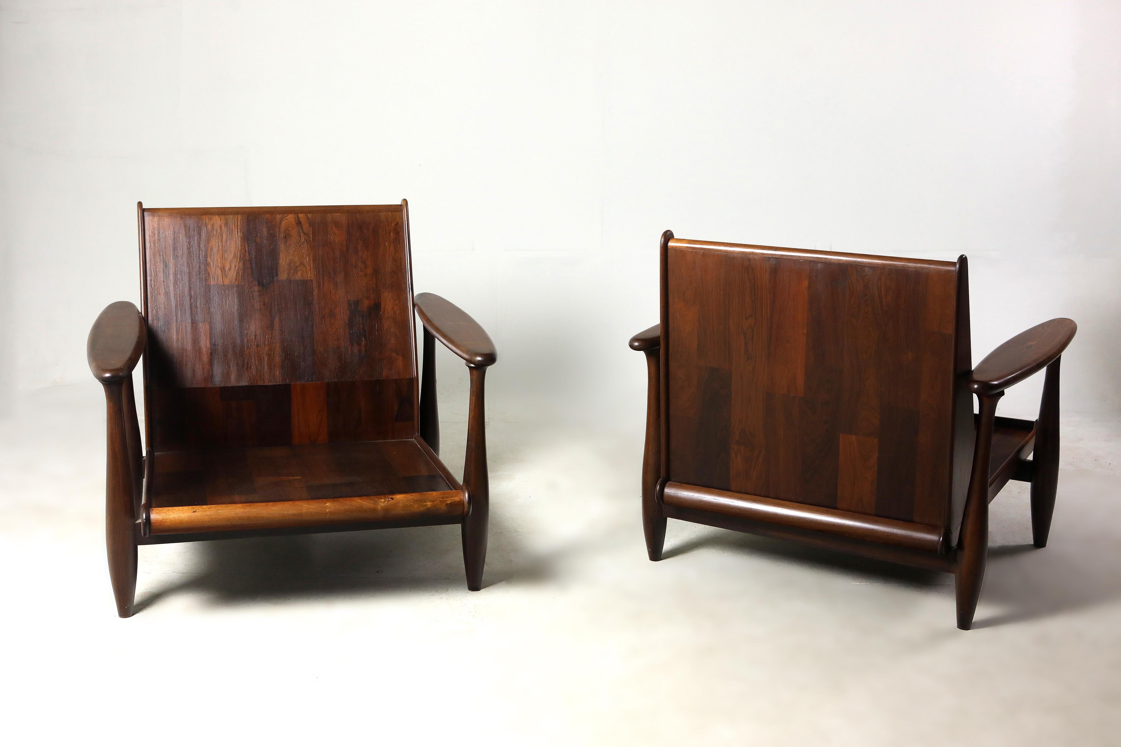 Brazilian Mid-Century Modern pair of armchairs by Liceu de Artes e Ofícios manufacture, Brazil, 1960s.

Pair of armchairs by the Brazilian manufacture Liceu de Artes e Ofícios, dating the 1960s. The armchair's nicely rounded structure is in solid