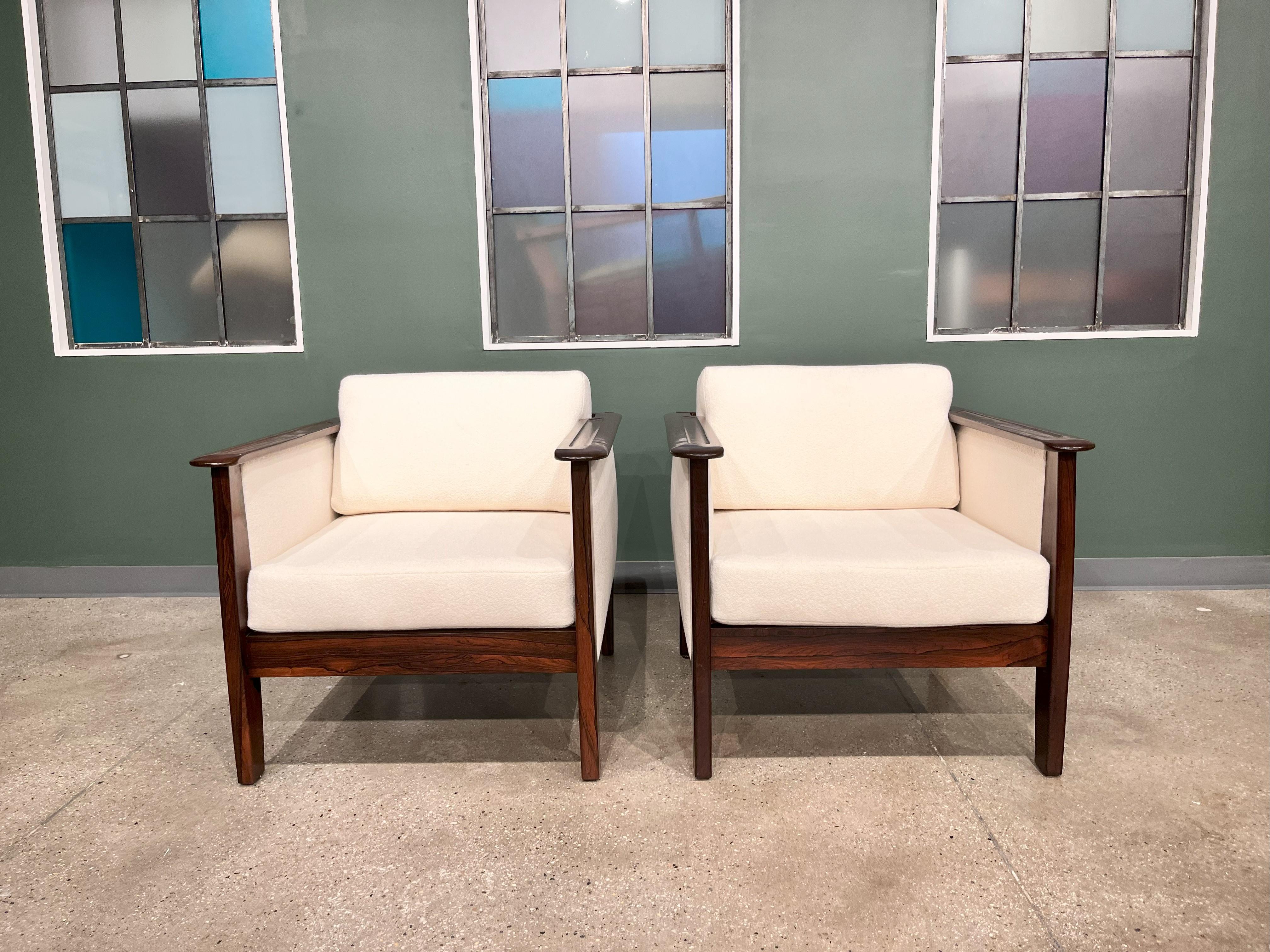 Available today in NYC, including free domestic shipping, this Mid-Century Modern Pair of Armchairs in Hardwood & Bouclé designed by Fatima is nothing less than a beauty!

Introducing a pair of cozy armchairs expertly crafted by Fatima during the