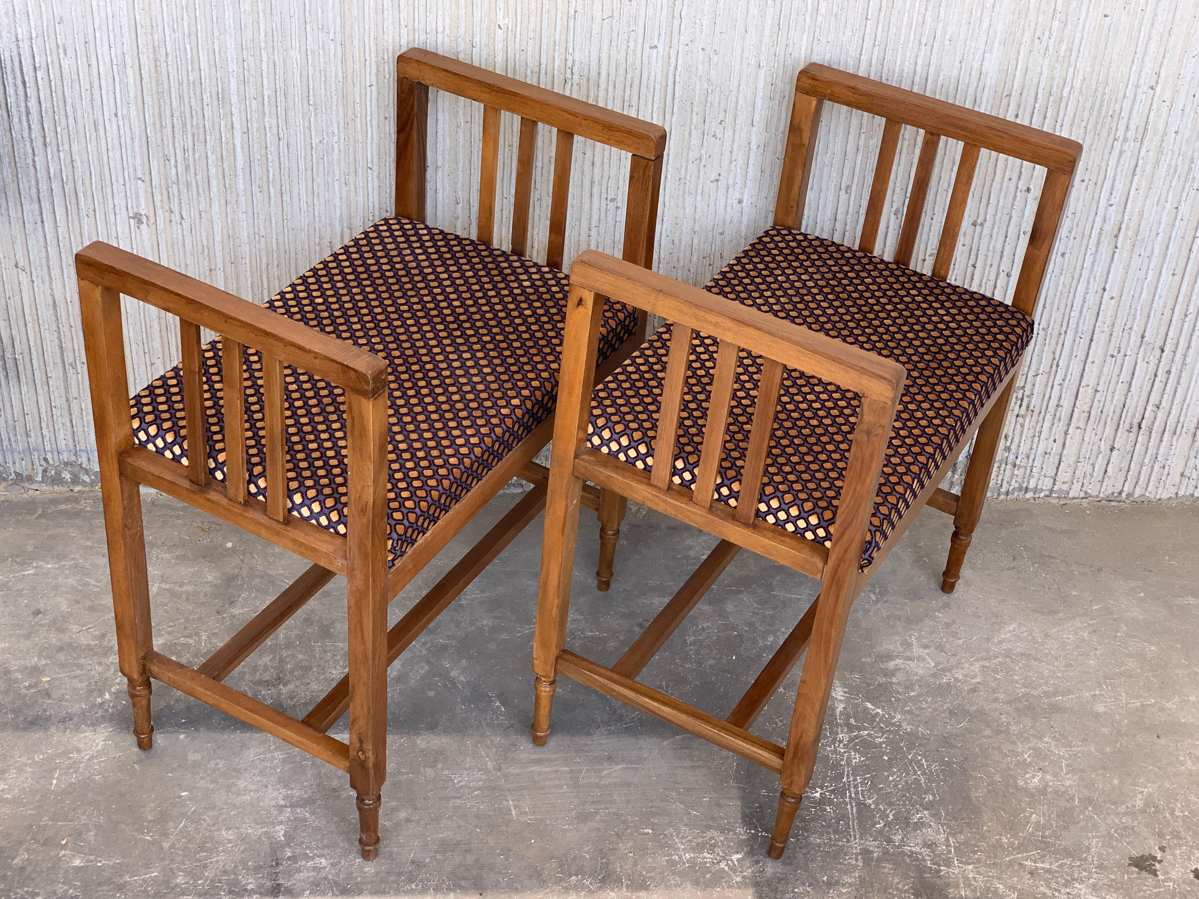 Mid-Century Modern pair of benchs, ottomans, footrest with new upholstered by Lizzo, Italy.
          