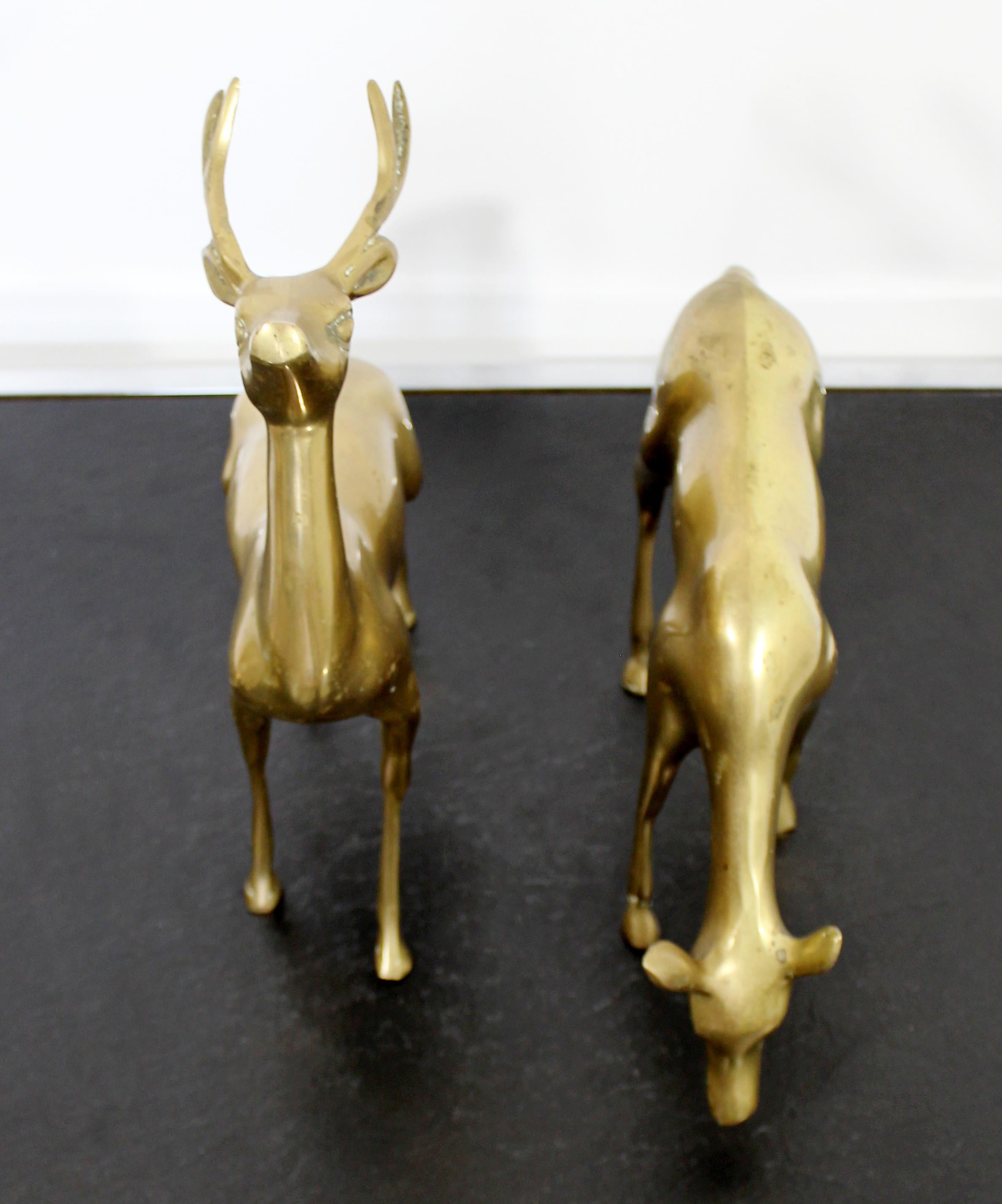 brass deer statues