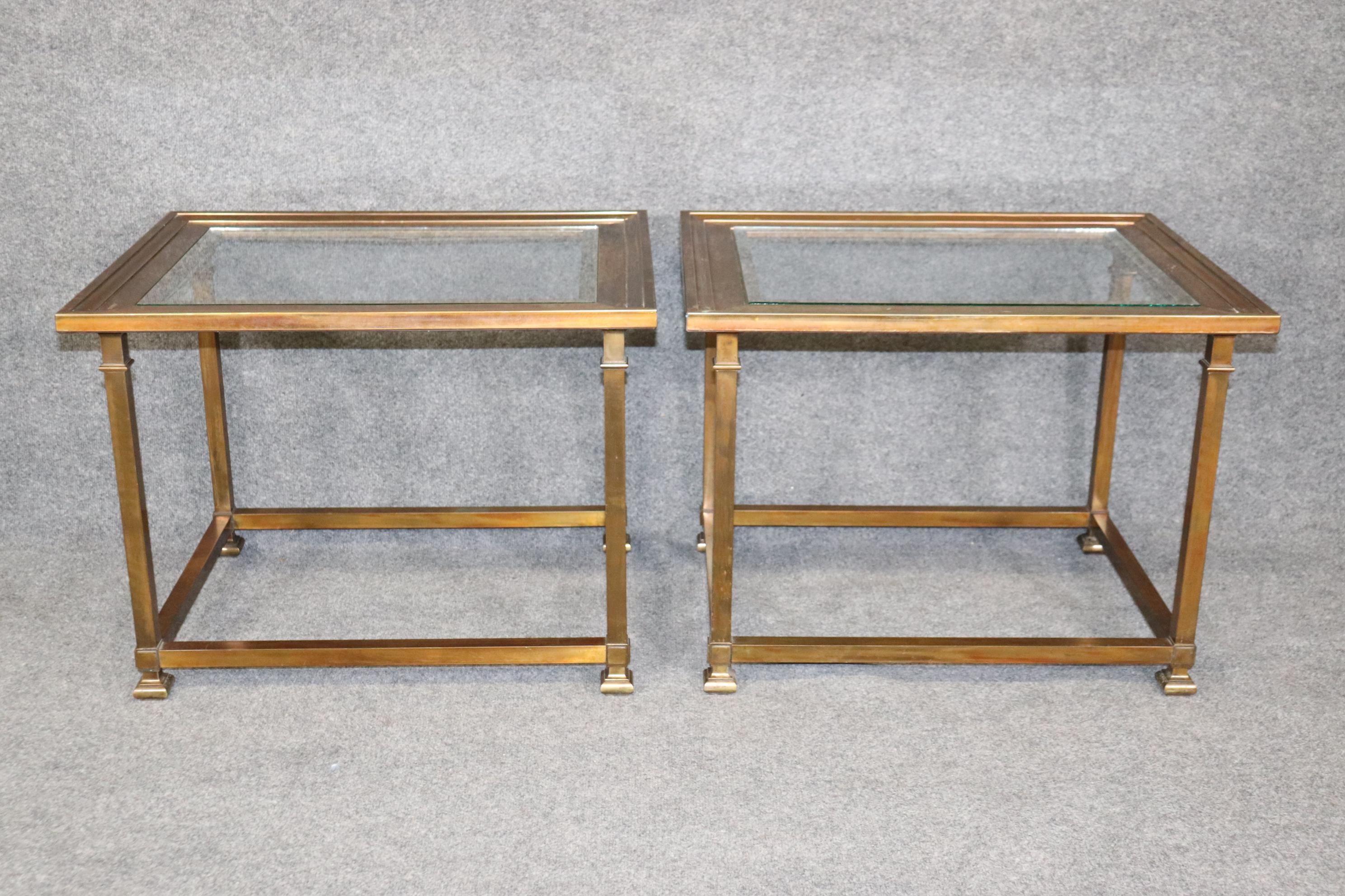 Dimensions- H: 21in W: 28in D: 22in 
This Mid-Century Modern Pair of Rectangular Brass Mastercraft Glass Top End Tables are made of the highest quality and are perfect for you and your home! If you take a look at the photos provided you will see