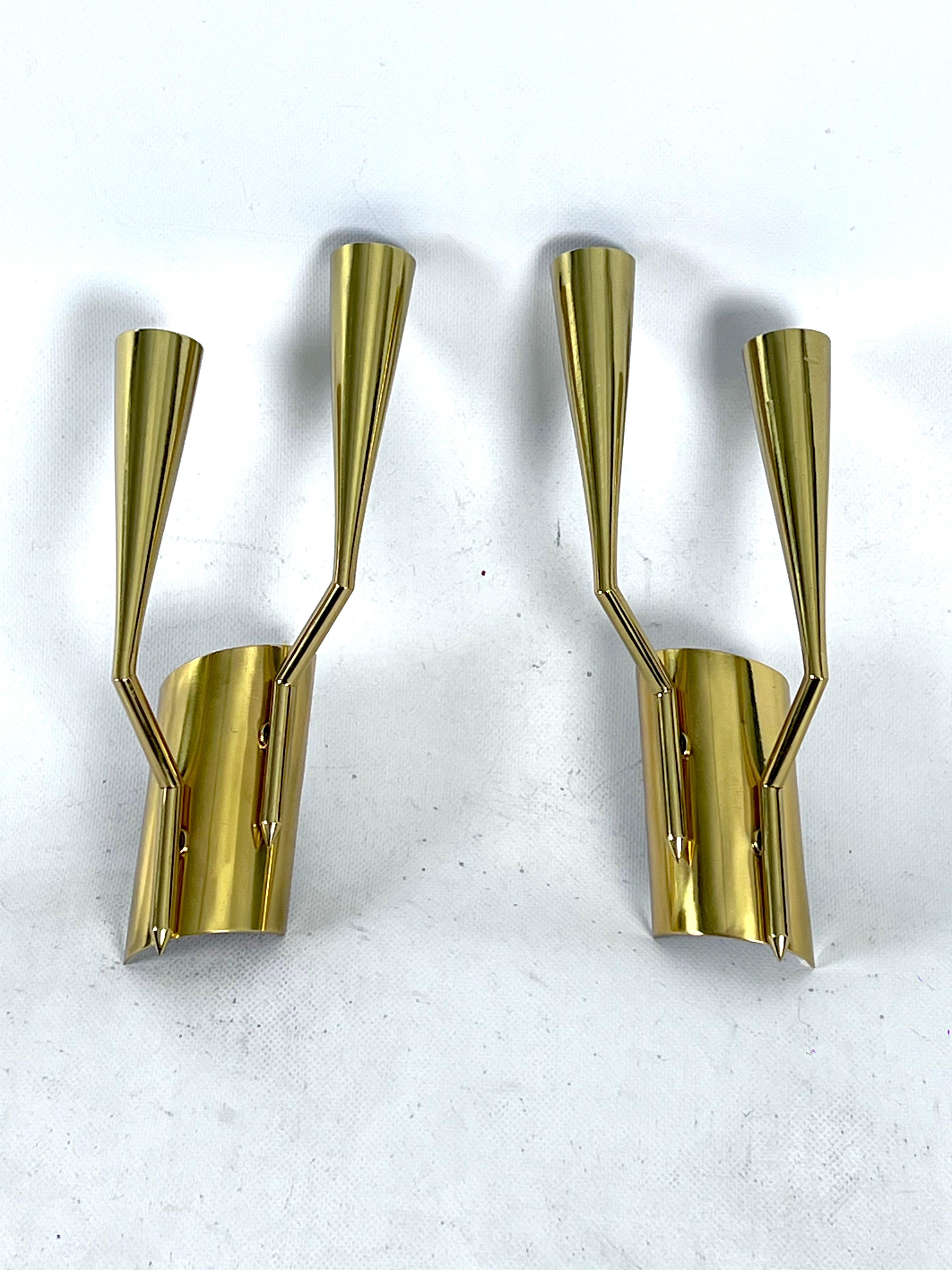 Great condition for this set of two sconces designed by Oscar Torlasco for Lumi Milano. Produced in Italy during the 1950s. Full working with EU standard, adaptable on demand for USA standard.

