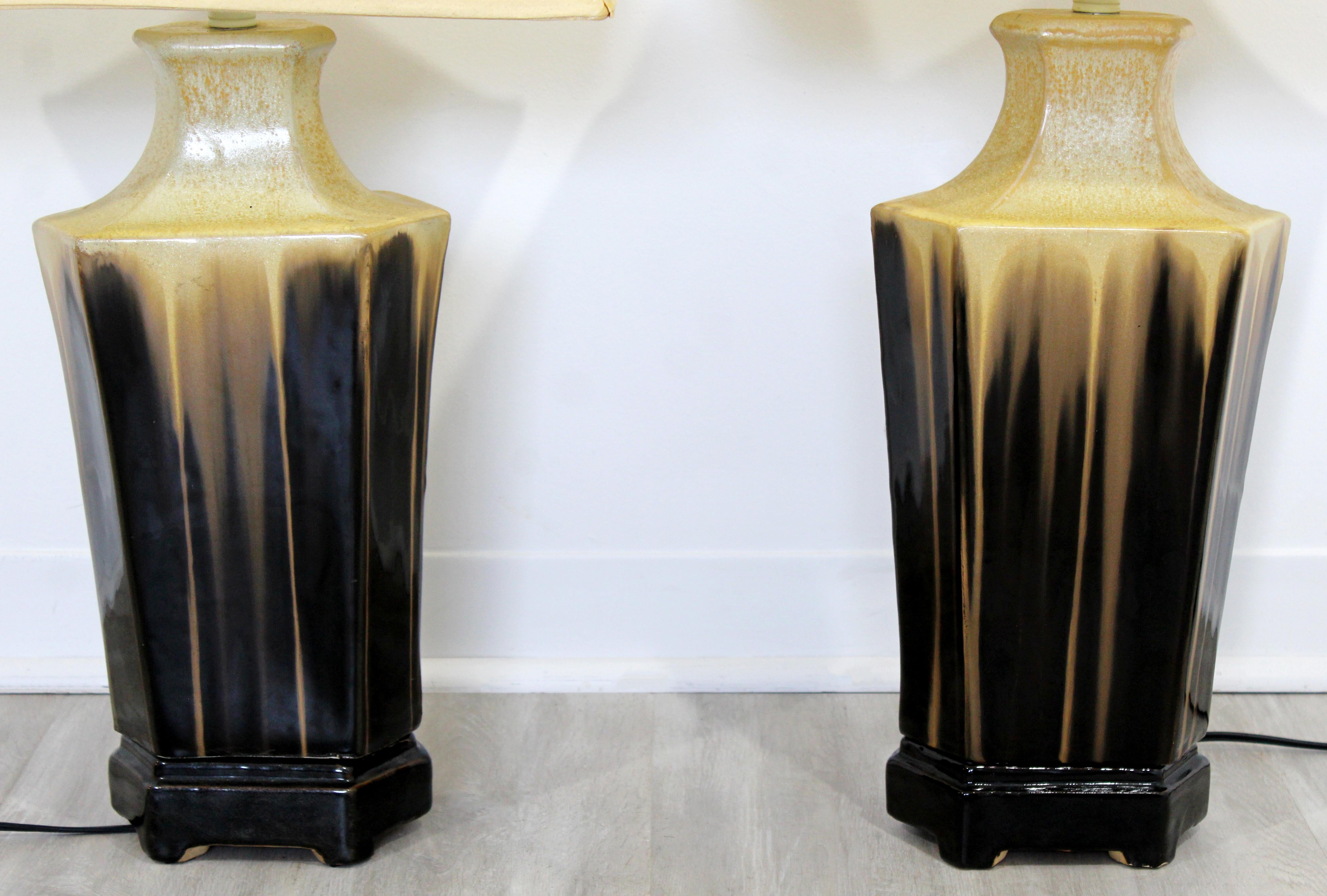 For your consideration is a stunning pair of brown, drip glazed ceramic table lamps, circa 1960s. In excellent condition, but missing finials. The dimensions of the lamps are 9