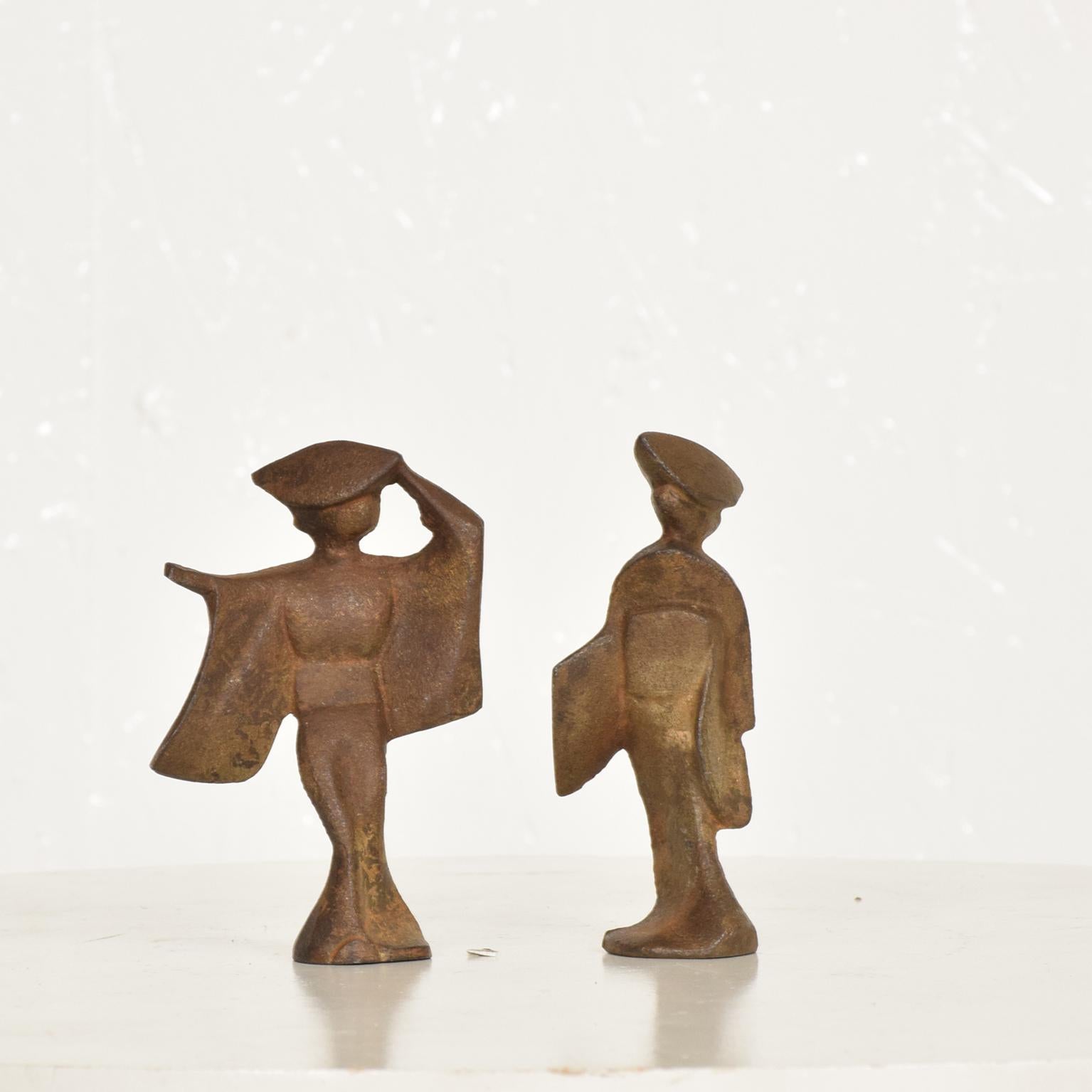 For your consideration, a pair of cast iron Japanese dancers paper weights, Japan, circa 1960s. Beautiful patina, gold painted.
Unmarked. 
Dimensions: 
Dancer #1, 4 1/8