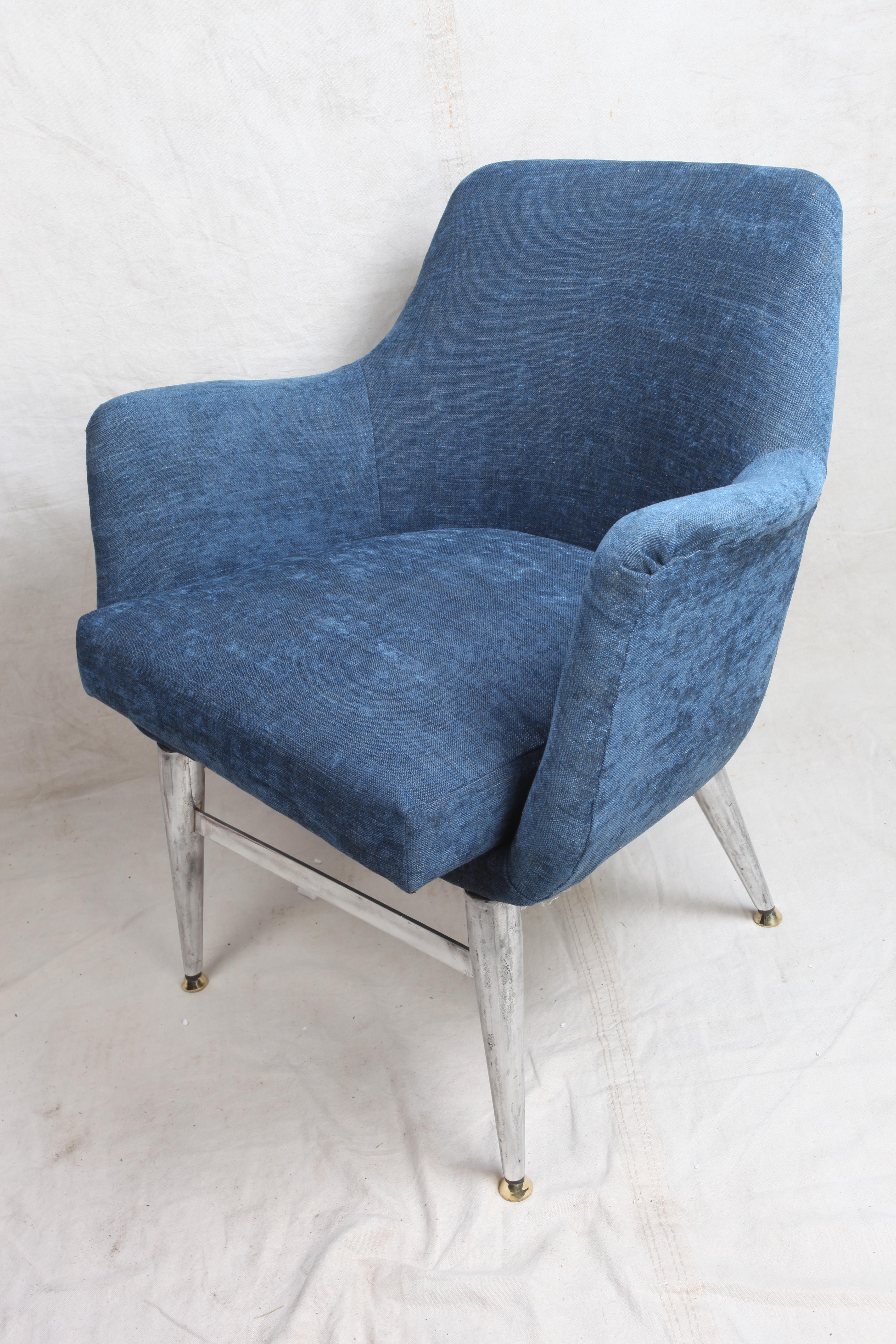 Pair of Mid-Century Modern arm chairs with chrome base and legs, and little brass feet. Reupholstered in a blue silk linen. Very comfortable and petite size. Seat cushion is fixed. European.