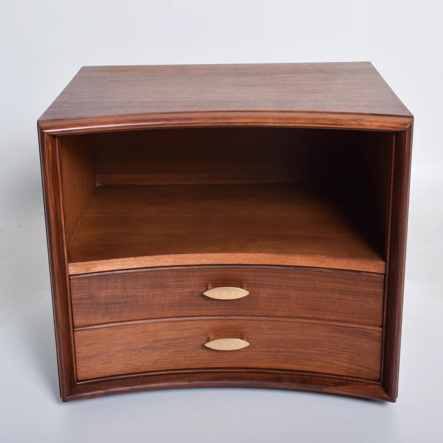 For your consideration, a Mid-Century Modern pair of curved walnut nightstands by Paul Frankl for John Stuart NY. Very unusual and rare to finds. Nightstands are constructed with the best materials. Curved fronts with double dovetail construction.