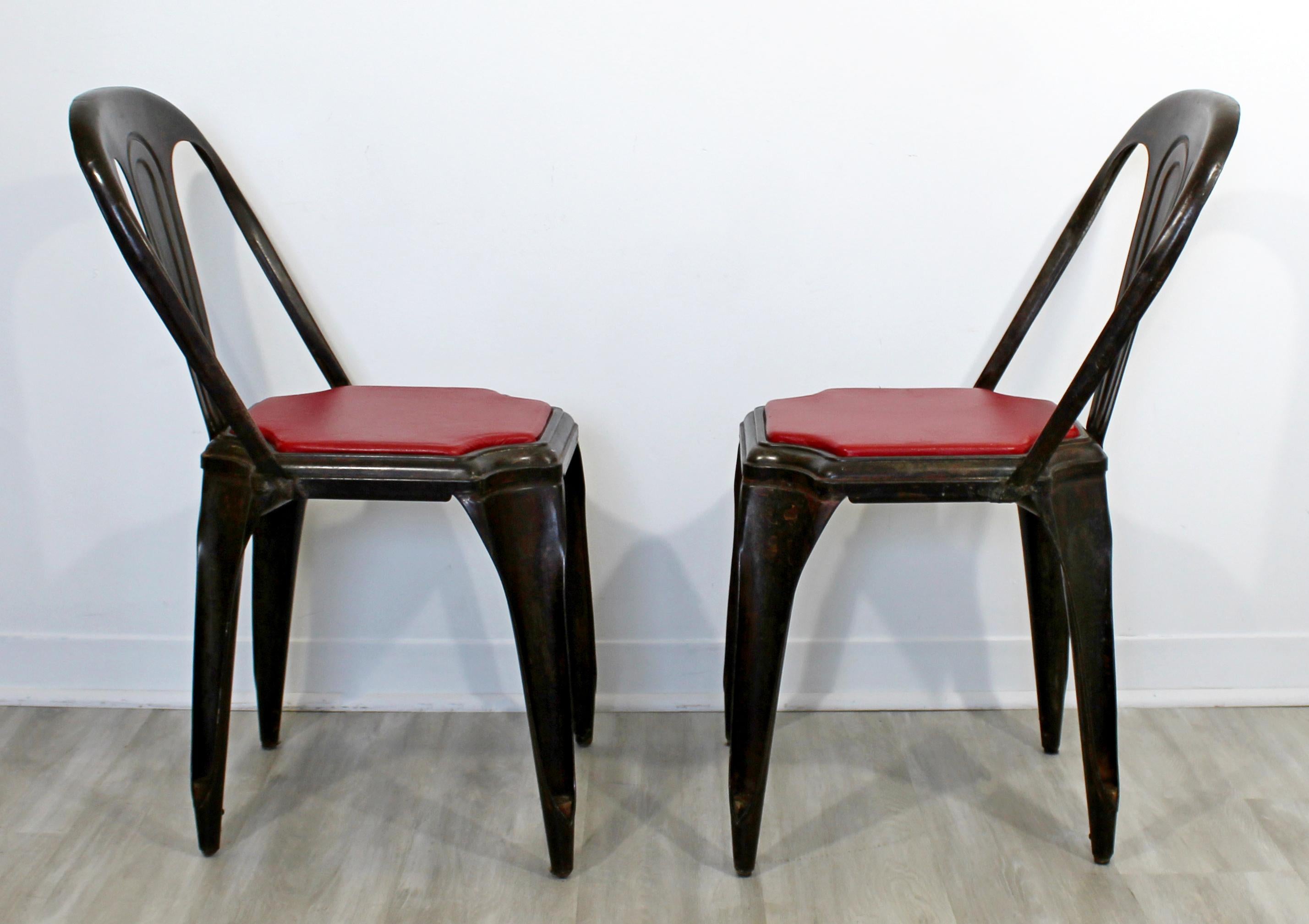 For your consideration is a phenomenal pair of Fibrocit, stacking, bistro chairs, made in France, circa 1950s. In very good vintage condition. The dimensions are 16.5