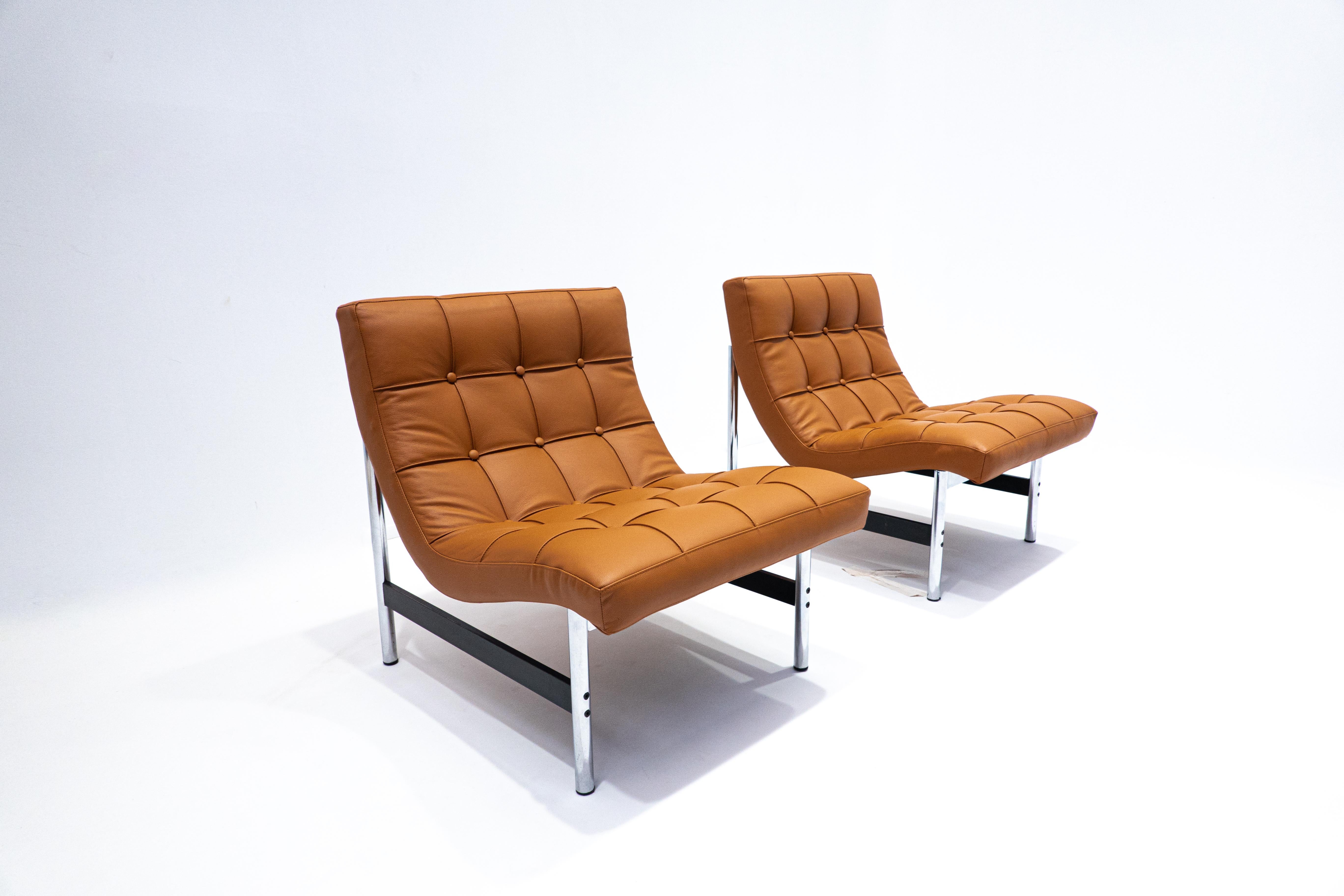 Mid-Century Modern pair of Italian armchairs, Cognac Leather, 1970s.