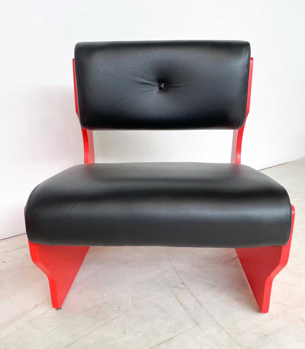 Mid-Century Modern Pair of Italian Armchairs, Red Lacquered Wood and Black Leather, 1980s.