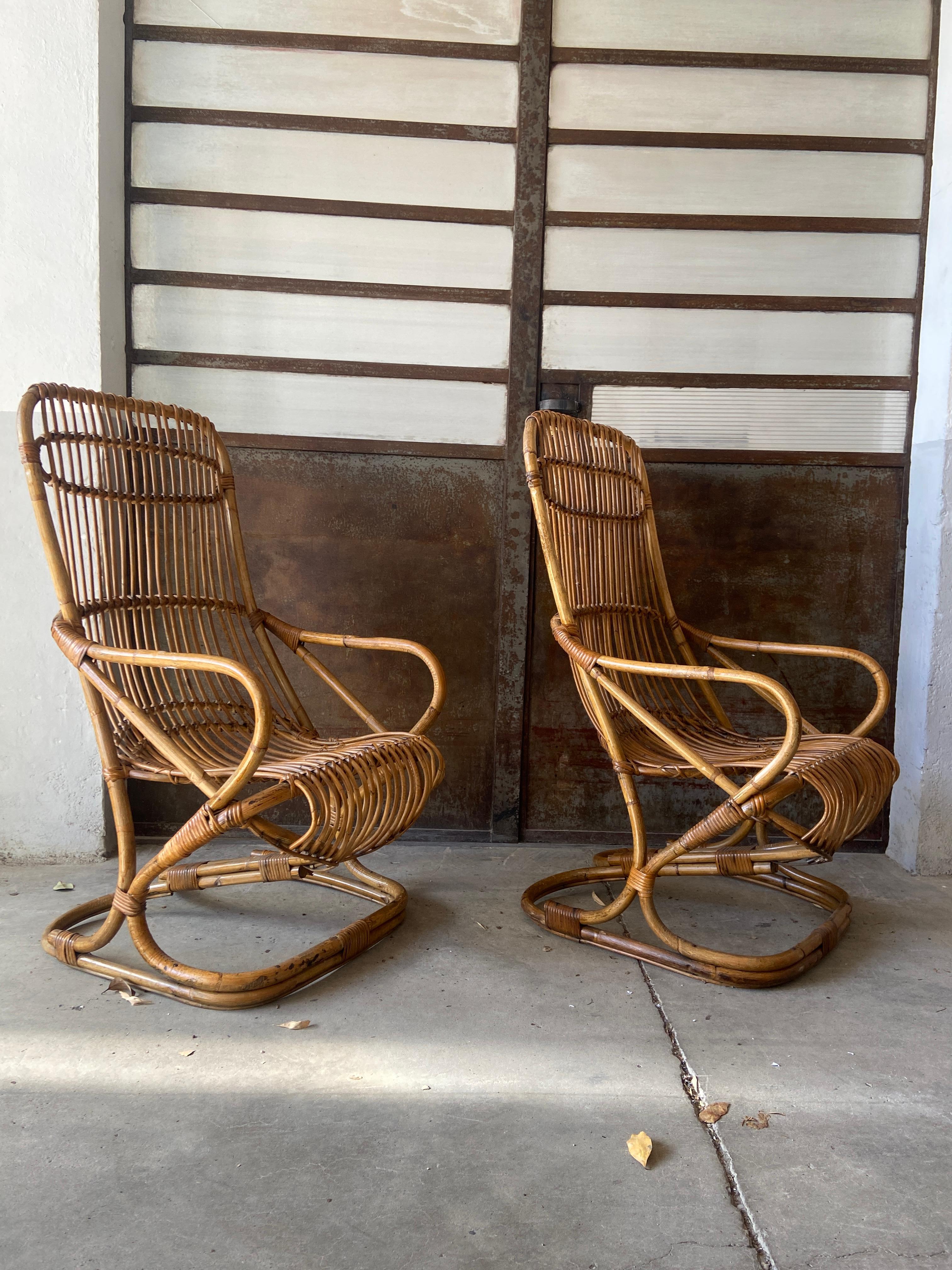 Mid-Century Modern pair of Italian bamboo and rattan armchairs by Tito Agnoli for Bonacina. 1960s
The Armchairs are in really good vintage condition with a beautiful patina due to age and use.