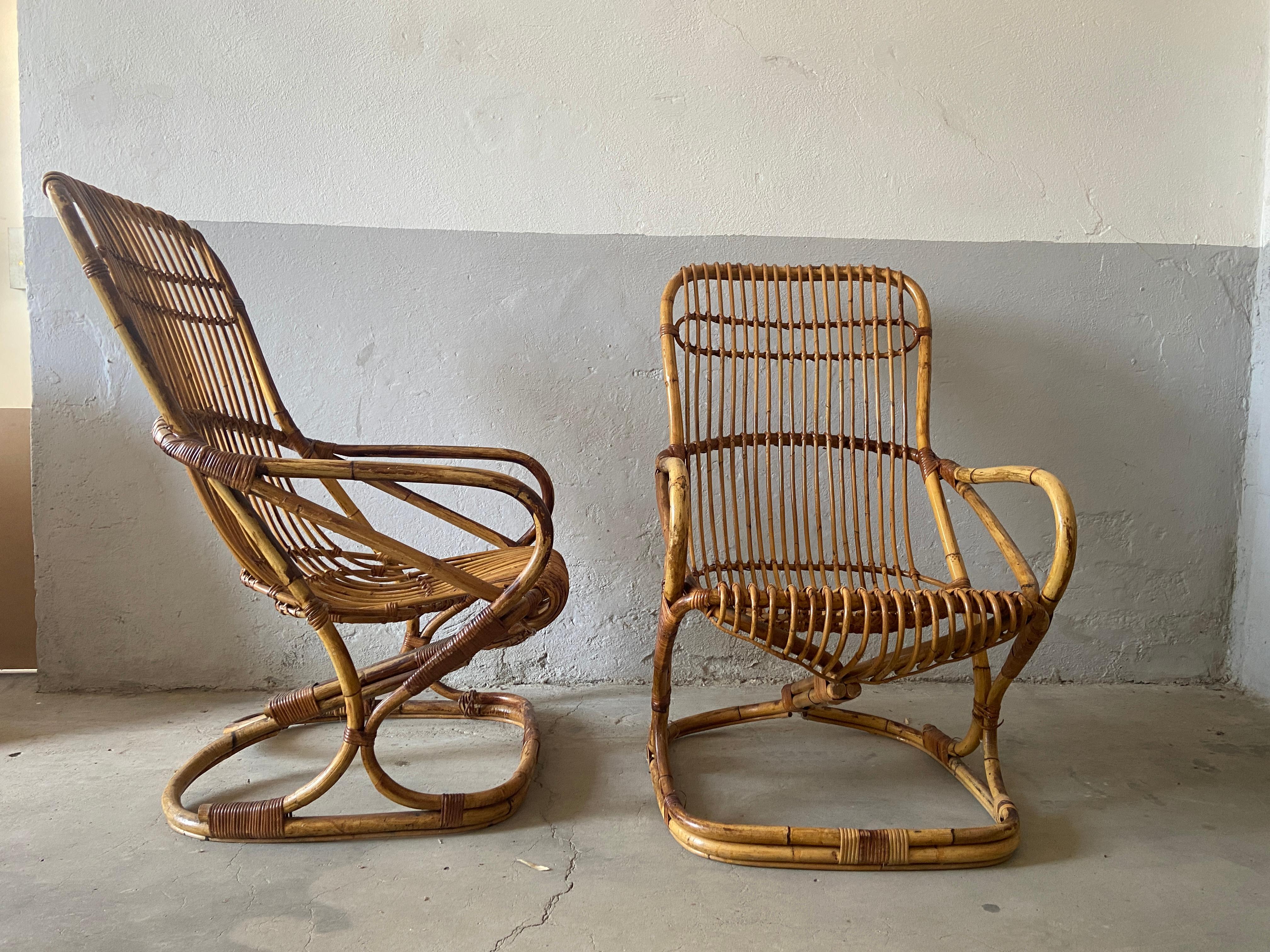 Mid-Century Modern pair of Italian bamboo and rattan armchairs in the style of Tito Agnoli. 1960s
The set is in really good vintage condition with a wonderful patina.
Wear consistent with age and use.
