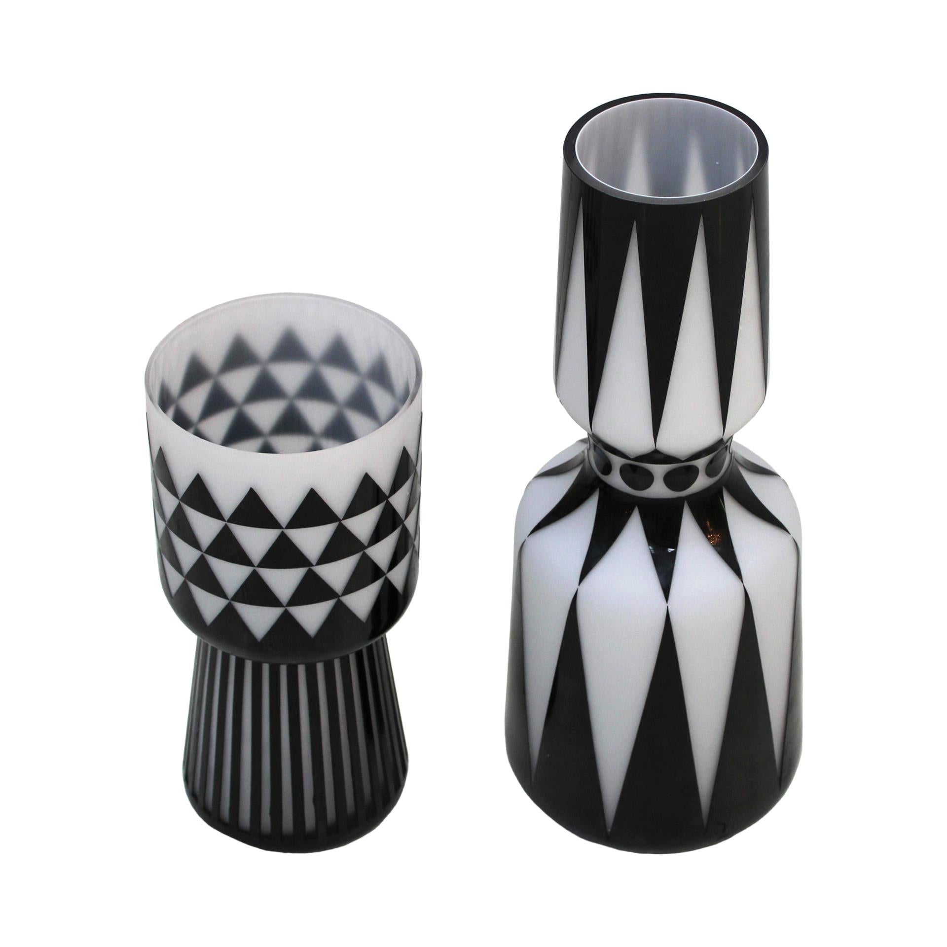Pair of Italian vases handcrafted in the 80s. With hand - carved geometric motifs.

Measures: Big vase: Diameter 17 x Height 44 cm

Small vase: Diameter 14 x Height 31 cm.

Every item LA Studio offers is checked by our team of 10 craftsmen in our
