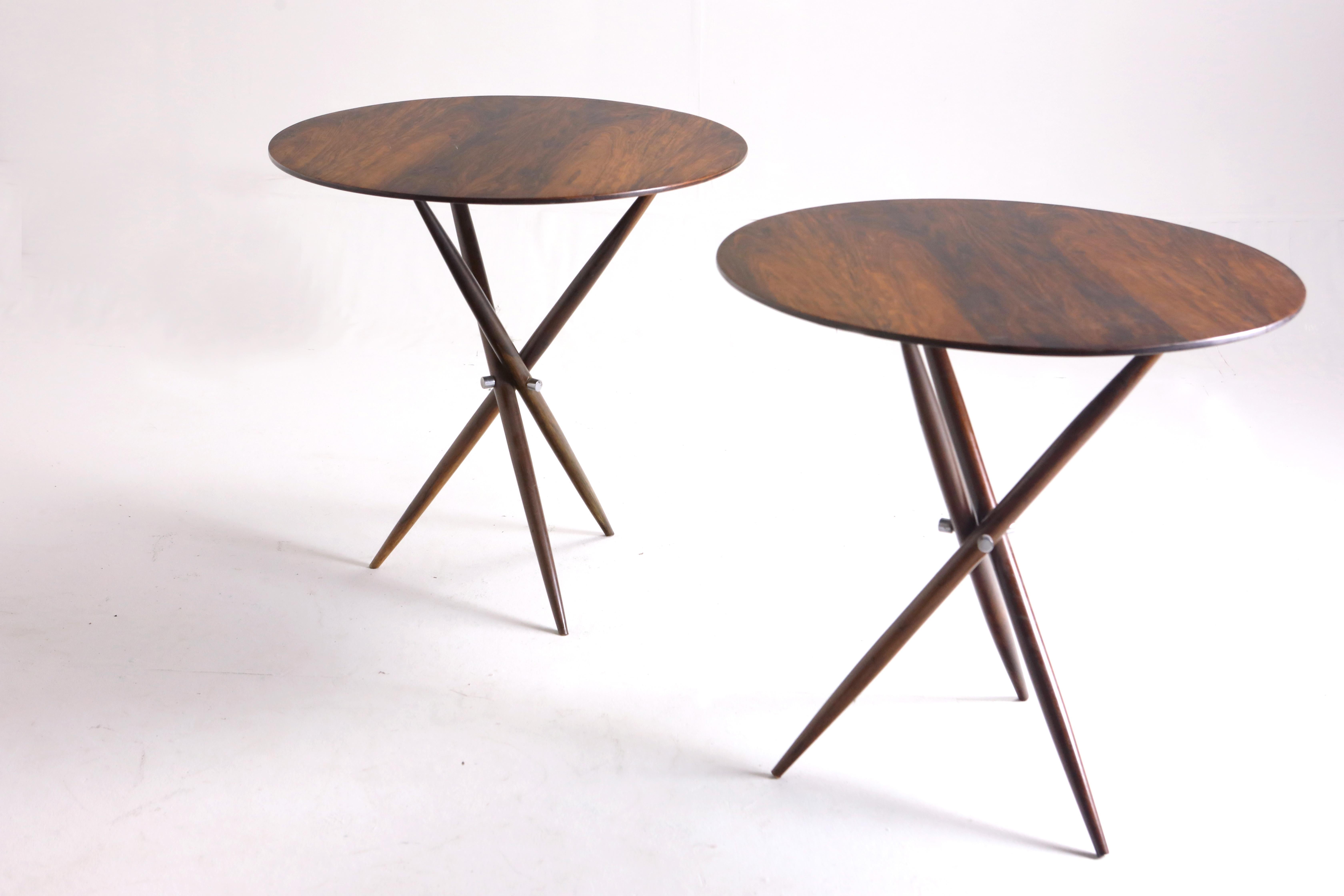 Mid-Century Modern pair of Janete round side tables by Sergio Rodrigues, Brazil 1950s

The elegant Janete side table is a 1950s creation by the acclaimed Brazilian architect and designer Sergio Rodrigues. Structured in wood, this table features a