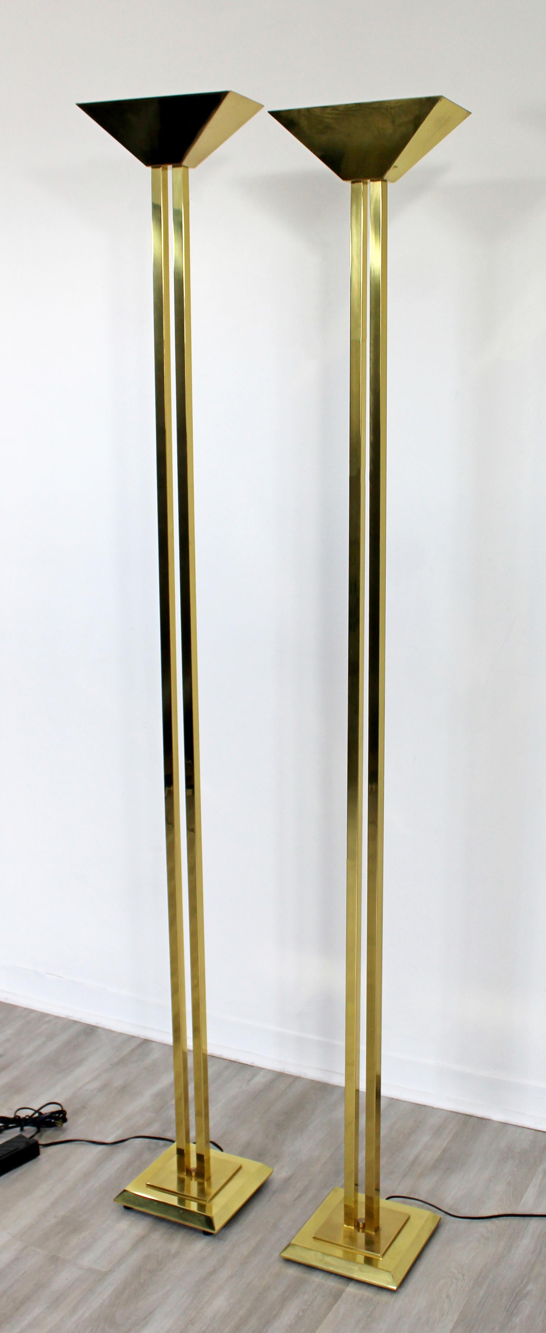 For your consideration is a terrific pair of brass torchiere floor lamps, by George Kovacs, circa 1970s. In excellent vintage condition. The dimensions are 10.5
