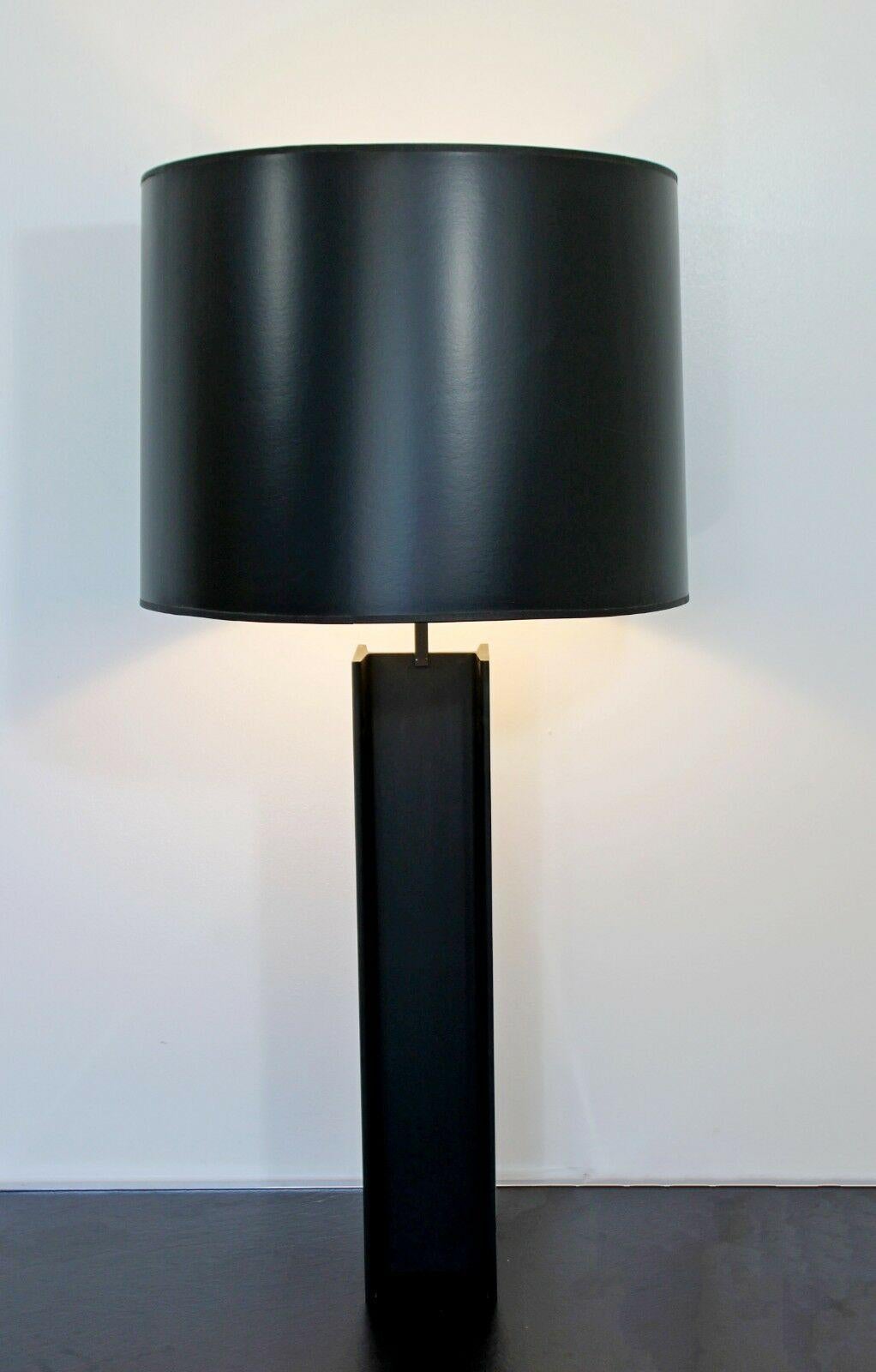 For your consideration is a phenomenal pair of I beam shaped, chrome and black metal, table lamps, with original shades and chrome finials, by Laurel Lamp Co, circa the 1970s. In excellent condition. The dimensions of the lamps are 5