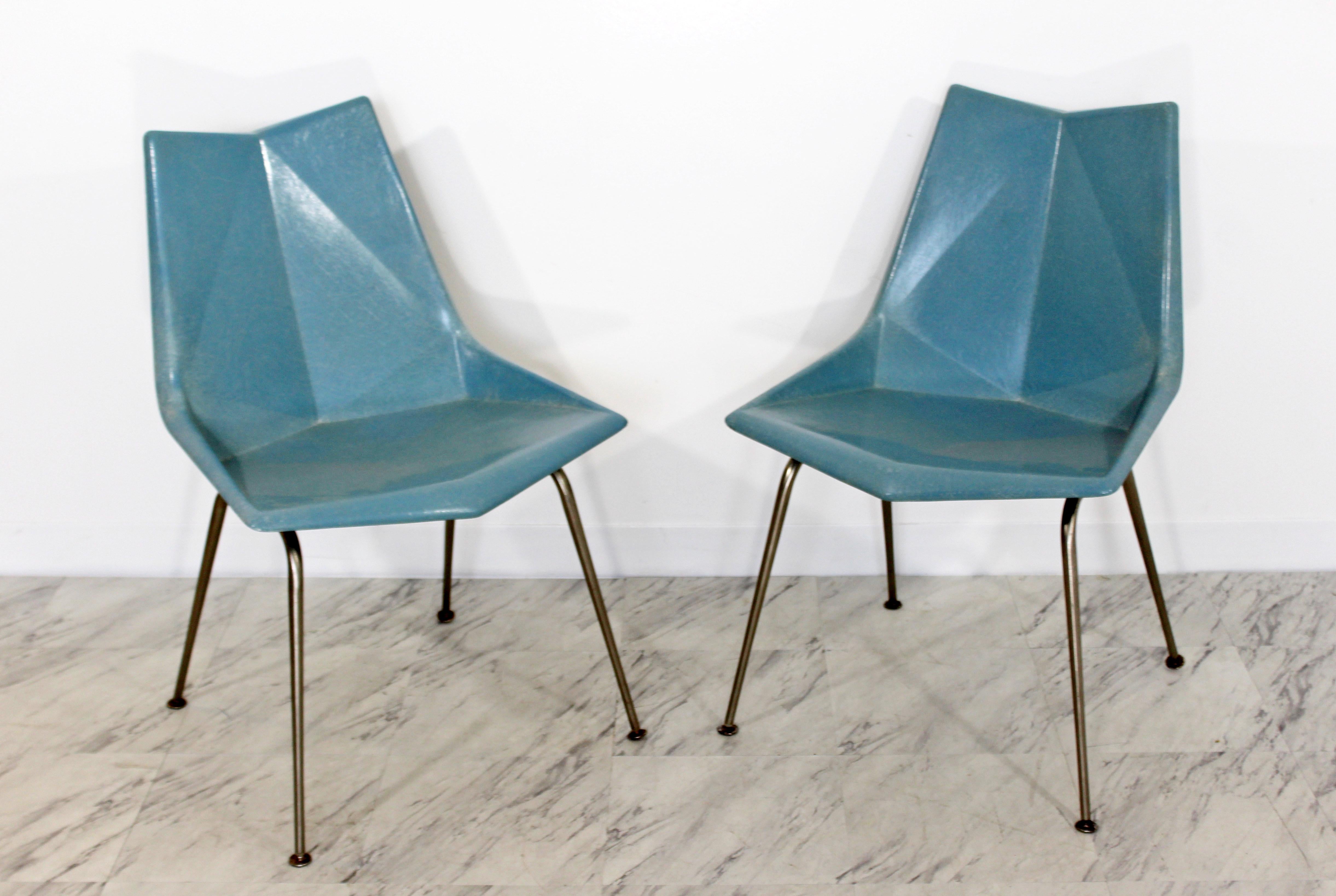 For your consideration is a magnificent, original pair of side chairs, with molded fiberglass reminiscent of Japanese origami, designed by Paul McCobb for St. John, circa the 1950s. In excellent condition. The dimensions are 21