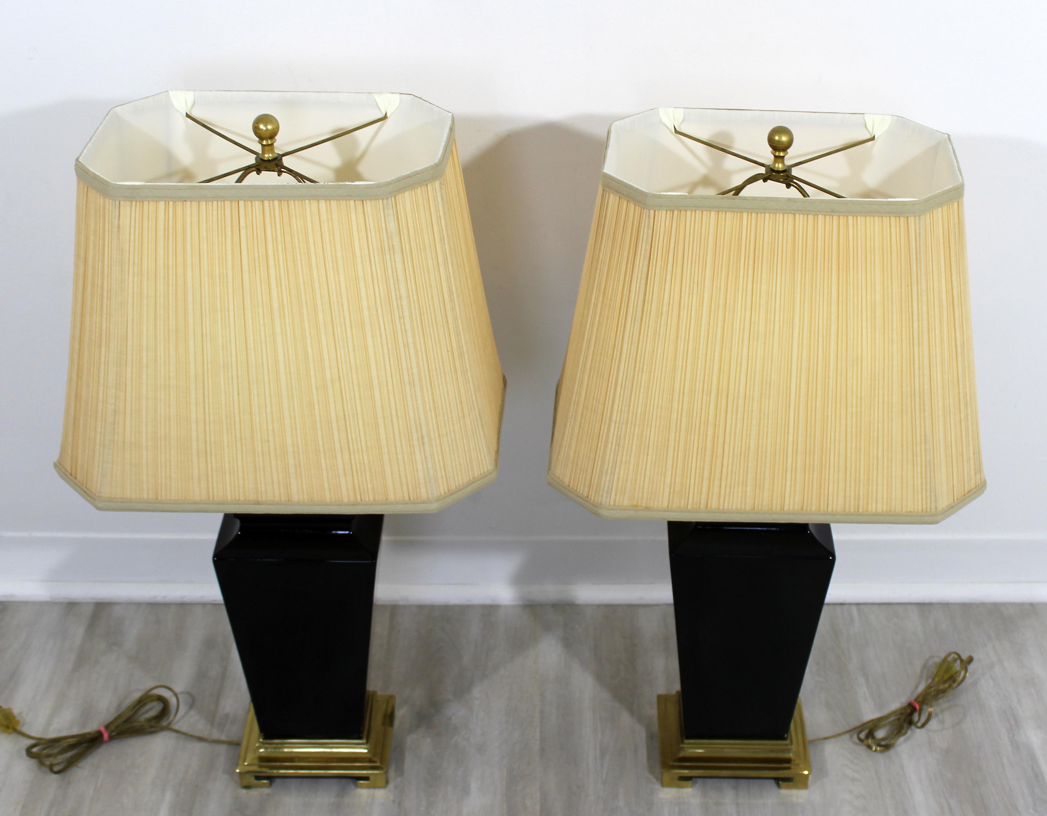 For your consideration is a fabulous pair of Hollywood Regency Asian ceramic table lamps, with original shades and finials, by Morris Greenspan, circa 1970s. In excellent vintage condition. The dimensions of the shades are 17