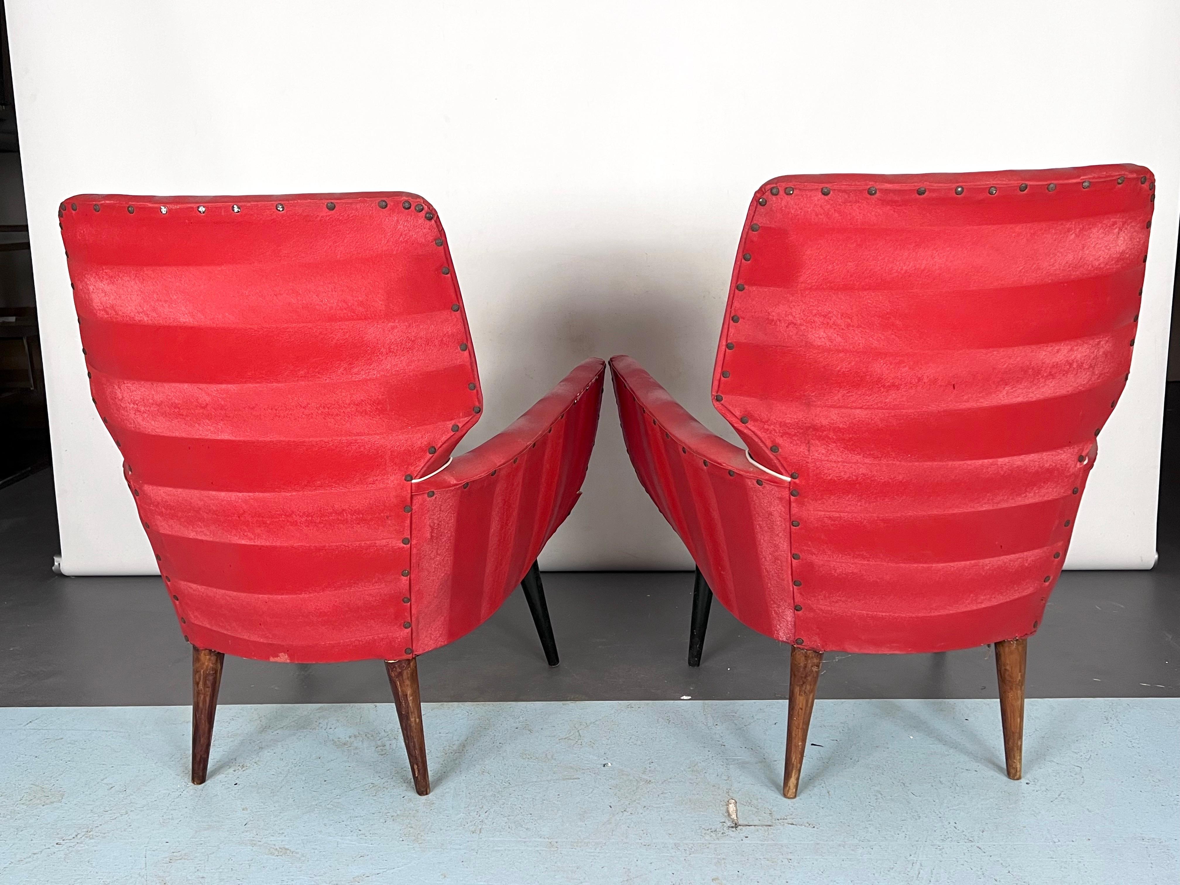 20th Century Mid-Century Modern Pair of red armchairs. Italy 1950s For Sale